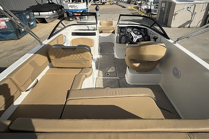 2023 Bayliner VR5 Bowrider OB interior with tan seating and modern dashboard.