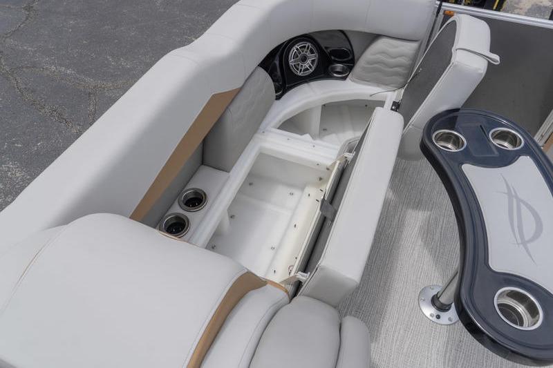 Luxurious seating and storage on 2026 SunCatcher Elite 326 SS pontoon boat.