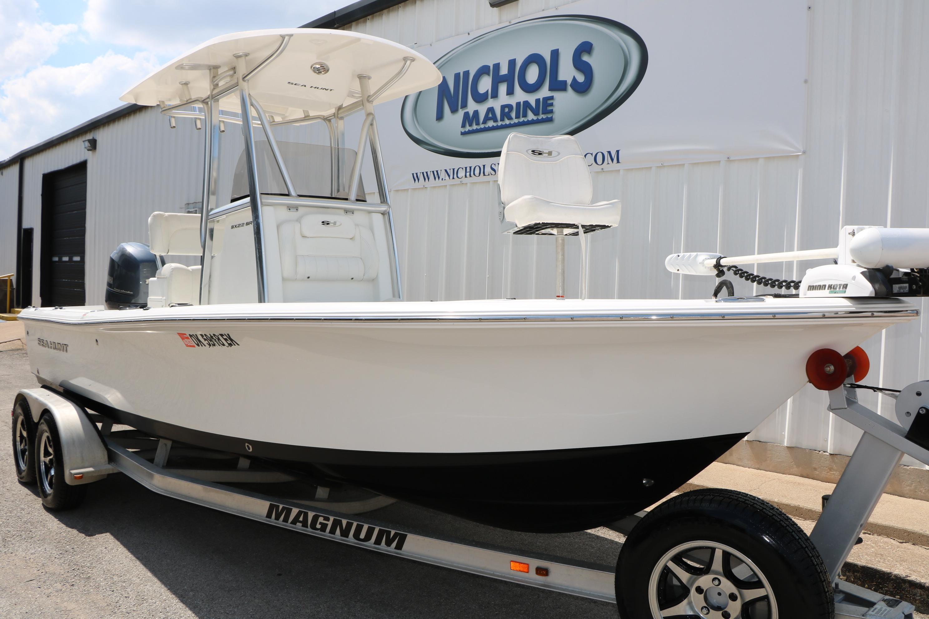 2015 Sea Hunt BX 22 BR boat on trailer at Nichols Marine dealership.