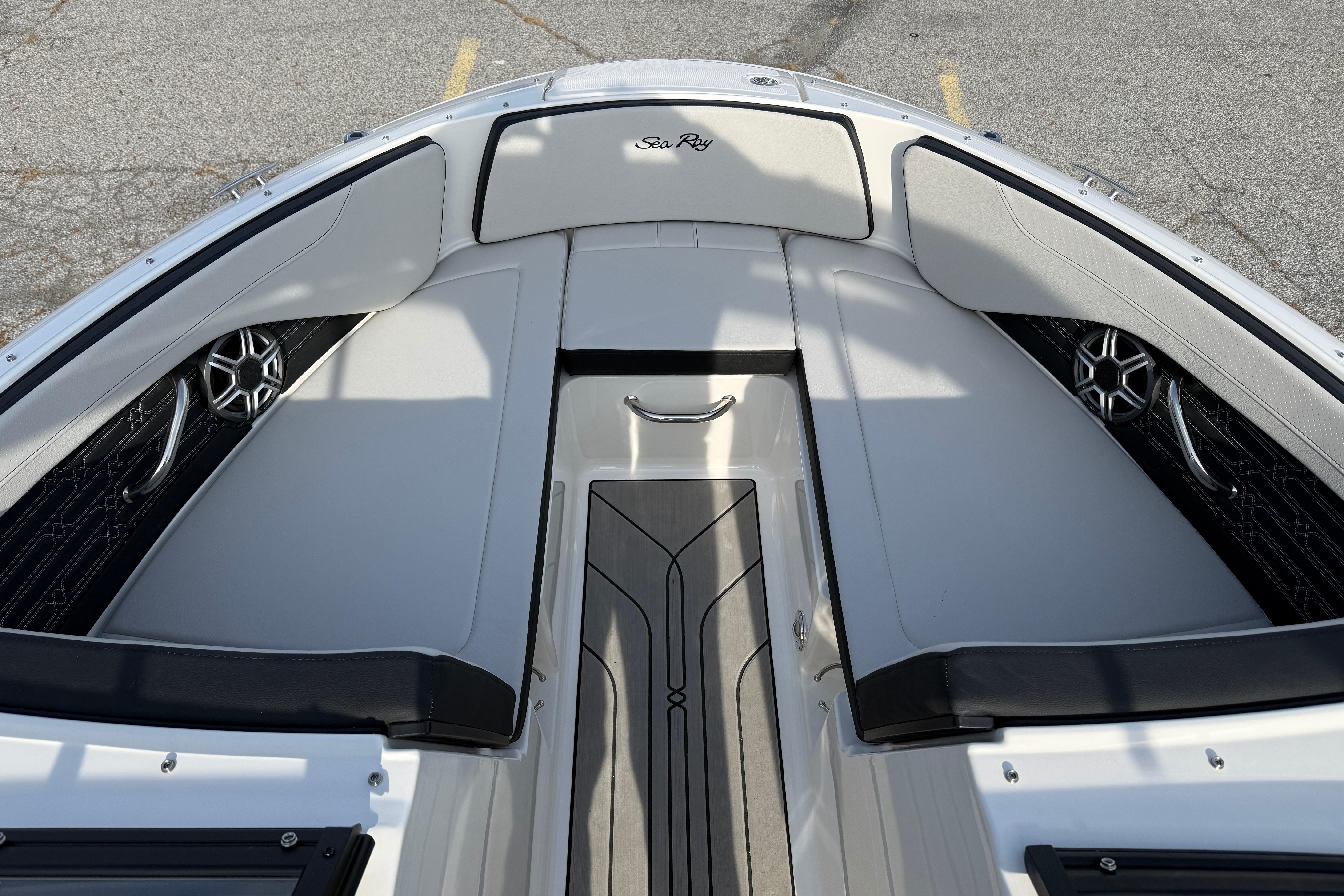 2026 Sea Ray SPX 210 Outboard boat interior with sleek seating and modern design.