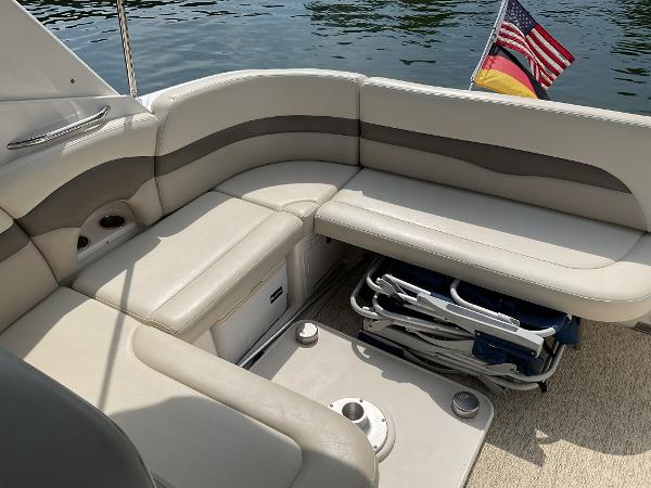 Interior of a 2008 Chaparral Signature 310 yacht with comfortable seating.