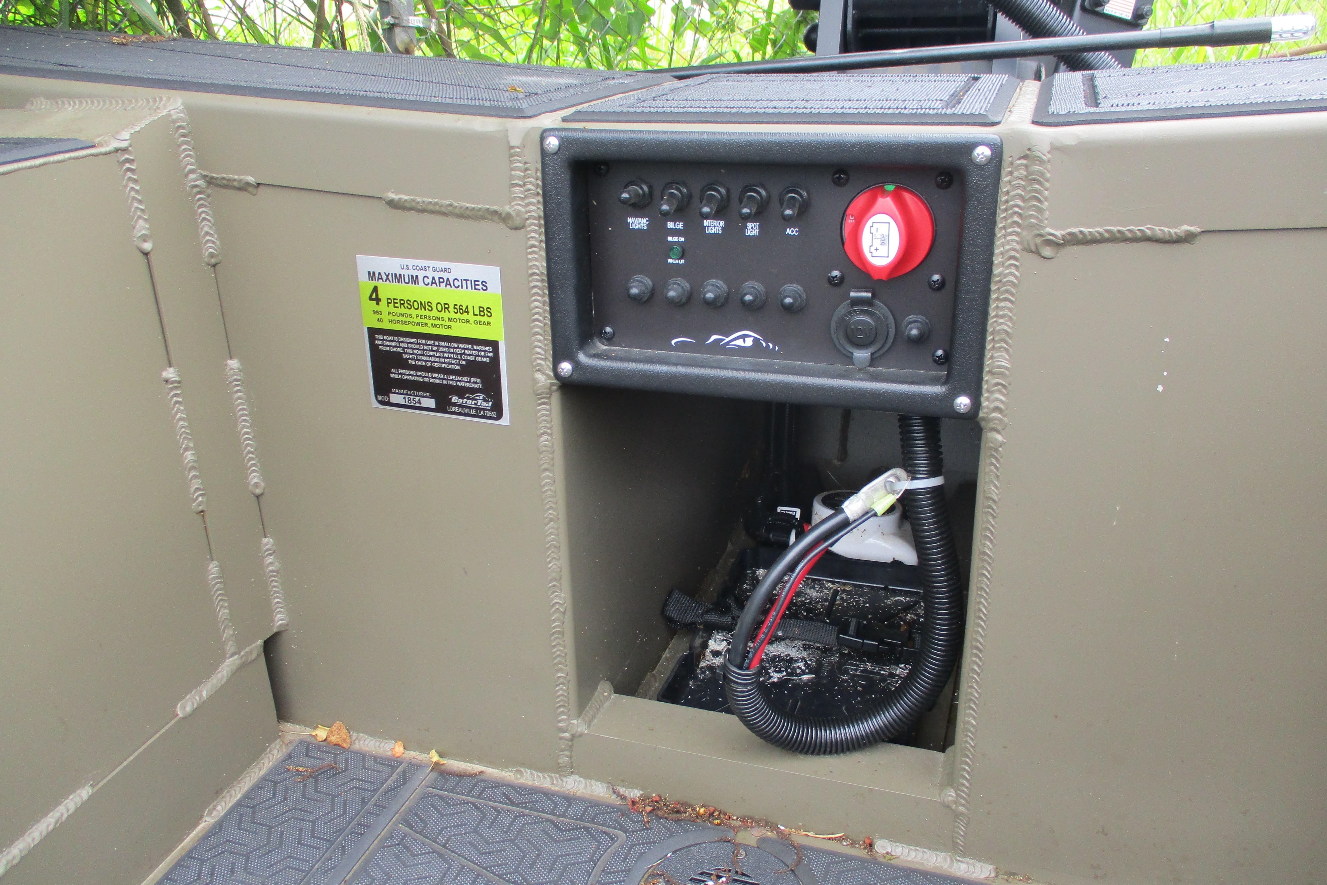 Control panel of 2026 Gator Tail 1854 Extreme boat, showing capacity and wiring details.