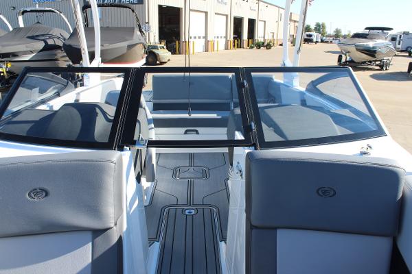 2025 Cobalt CS23 boat interior with gray seating and open deck.