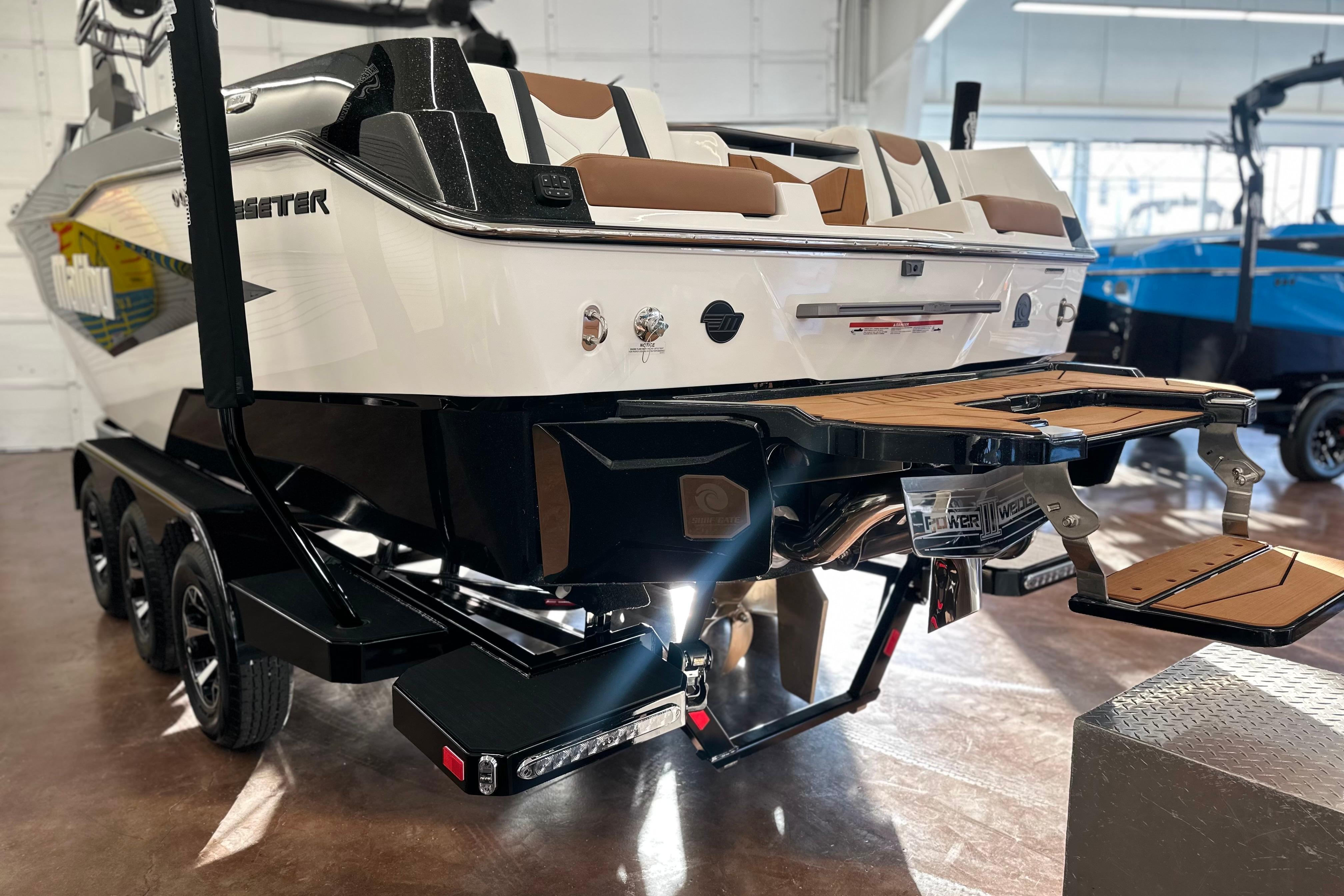 2026 Malibu Wakesetter 25 LSV boat on trailer, showcasing sleek design and modern features.