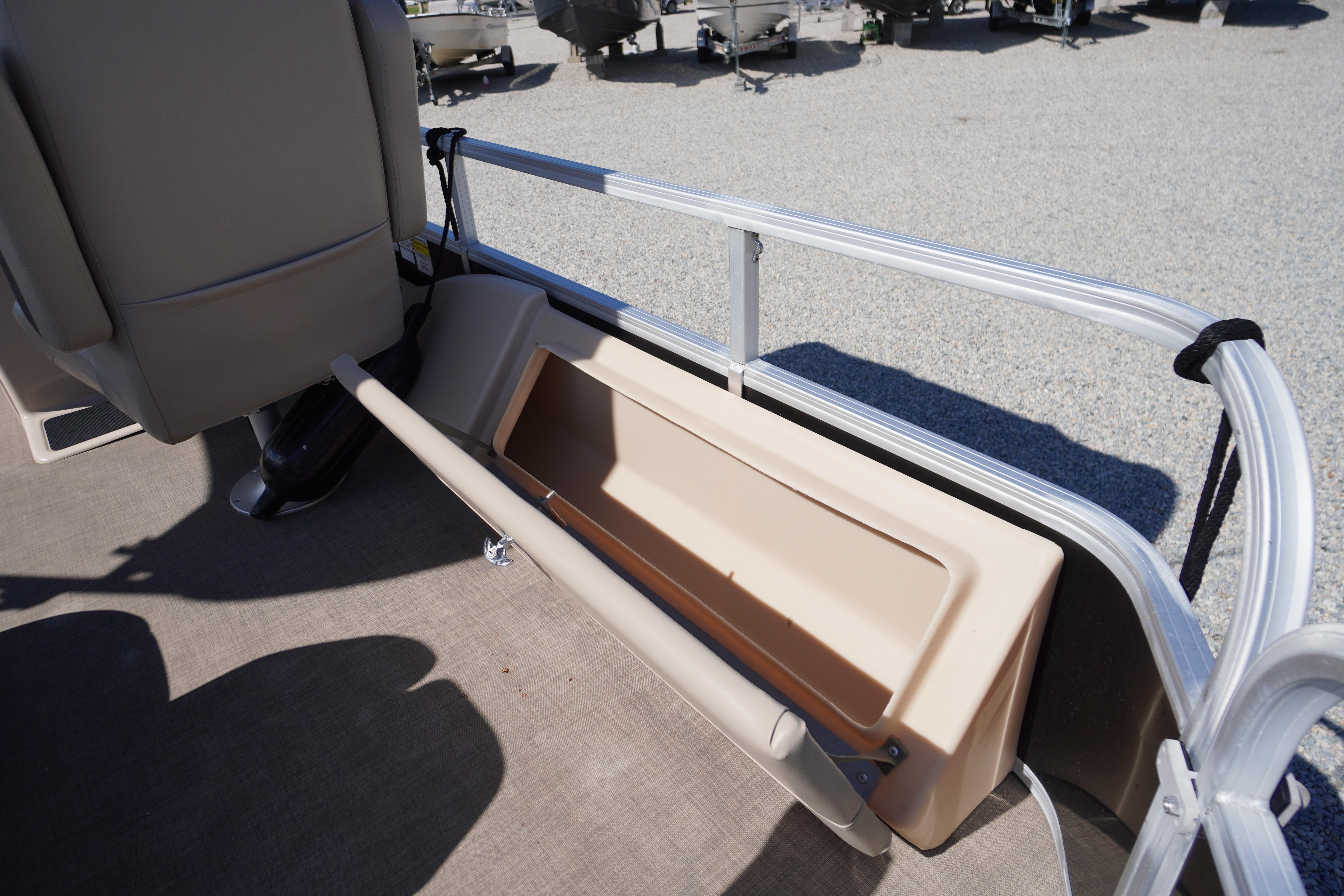 2019 SUNTRACKER Fishin' Barge 22 DLX storage compartment on deck.