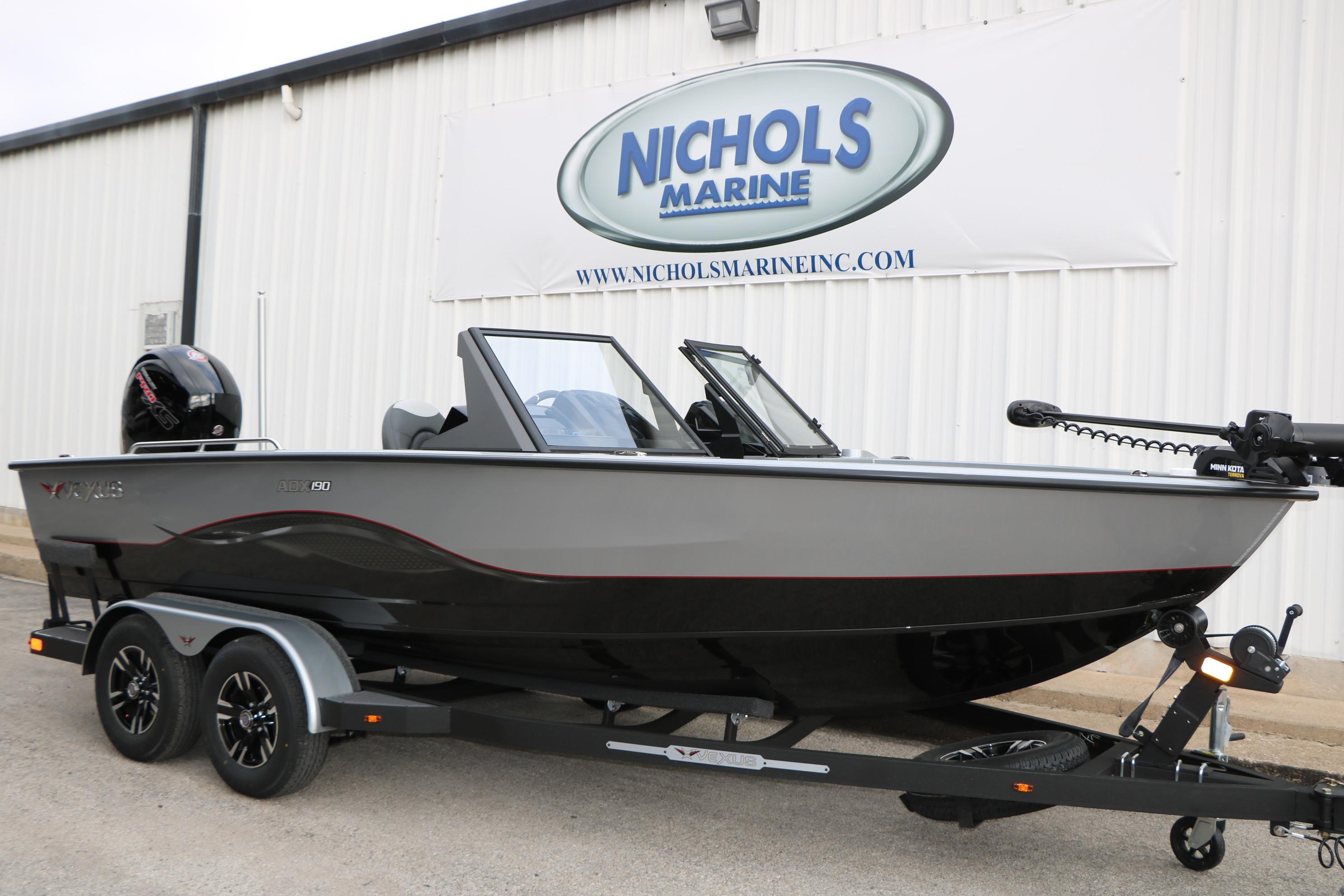2026 Vexus ADX 190 boat on trailer at Nichols Marine dealership.