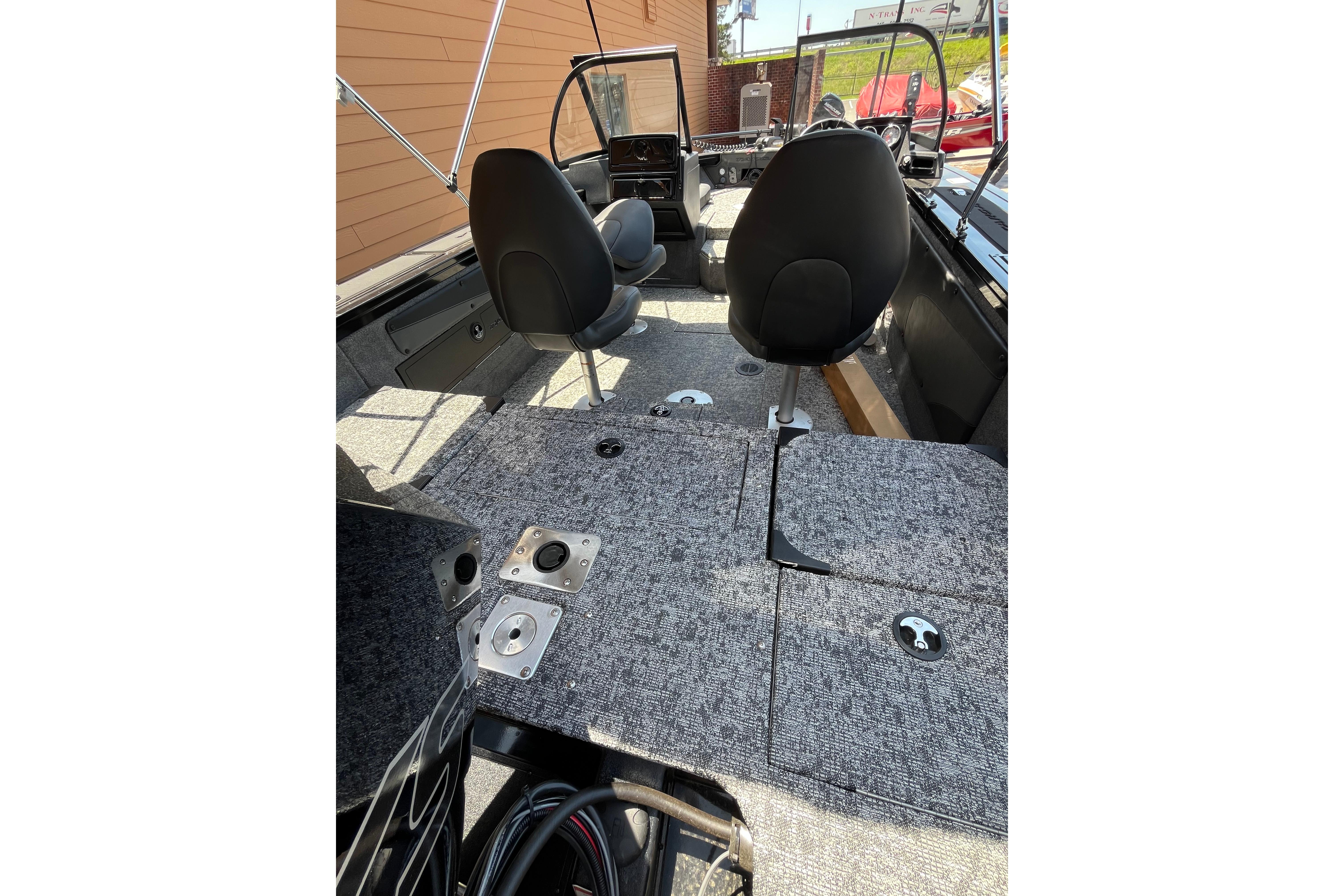 2026 Tracker Targa V-19 Combo boat interior with seating and carpeted deck.