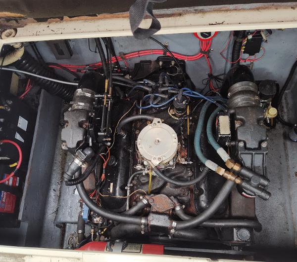 Engine compartment of a 1988 Sea Ray 268 DA boat, showing detailed wiring and components.