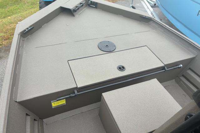 2026 Alweld 1760VV Marsh Console CC boat interior with storage compartment.