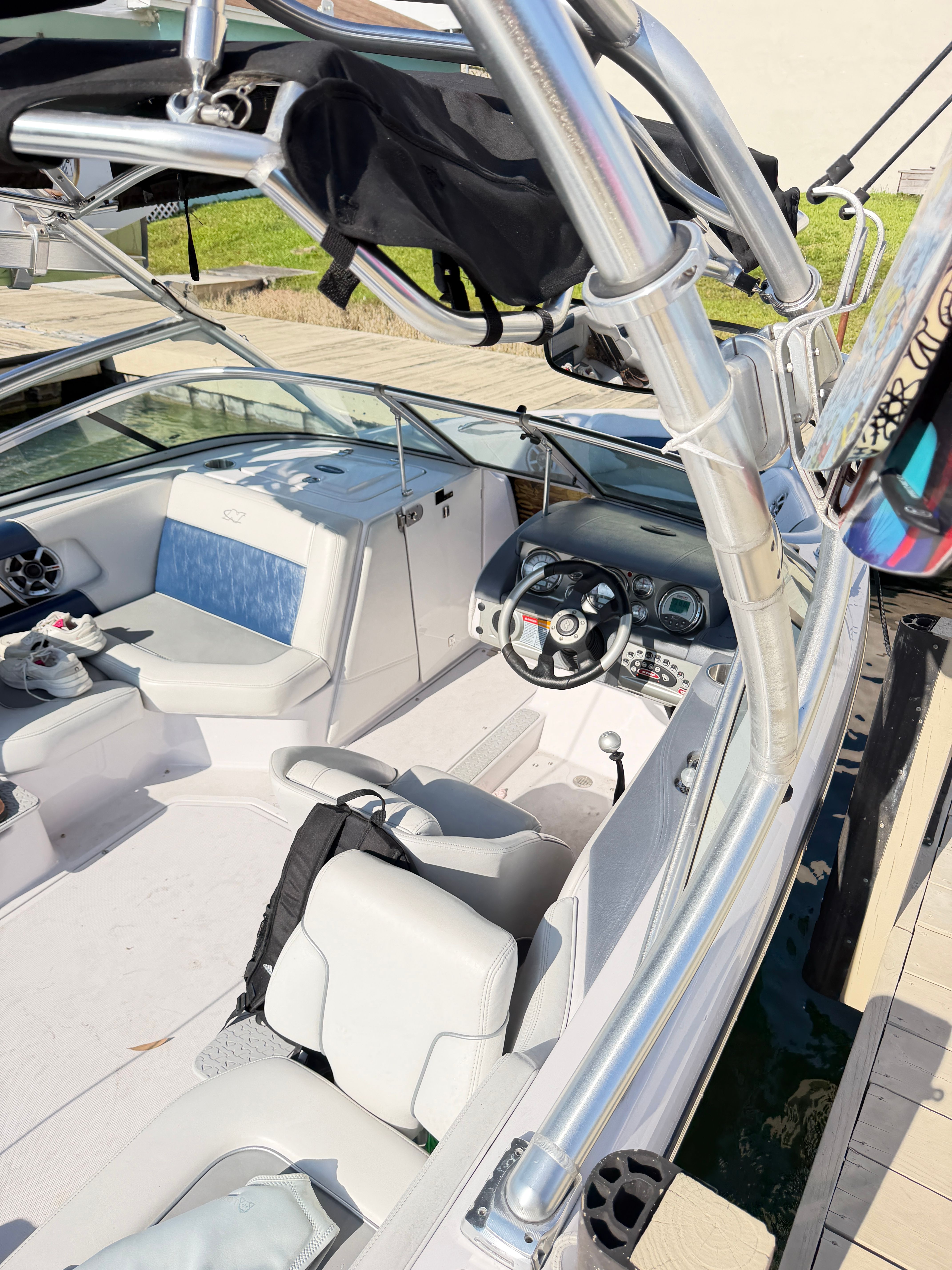 Interior of a 2008 Nautique 236 Team Edition boat at the dock.
