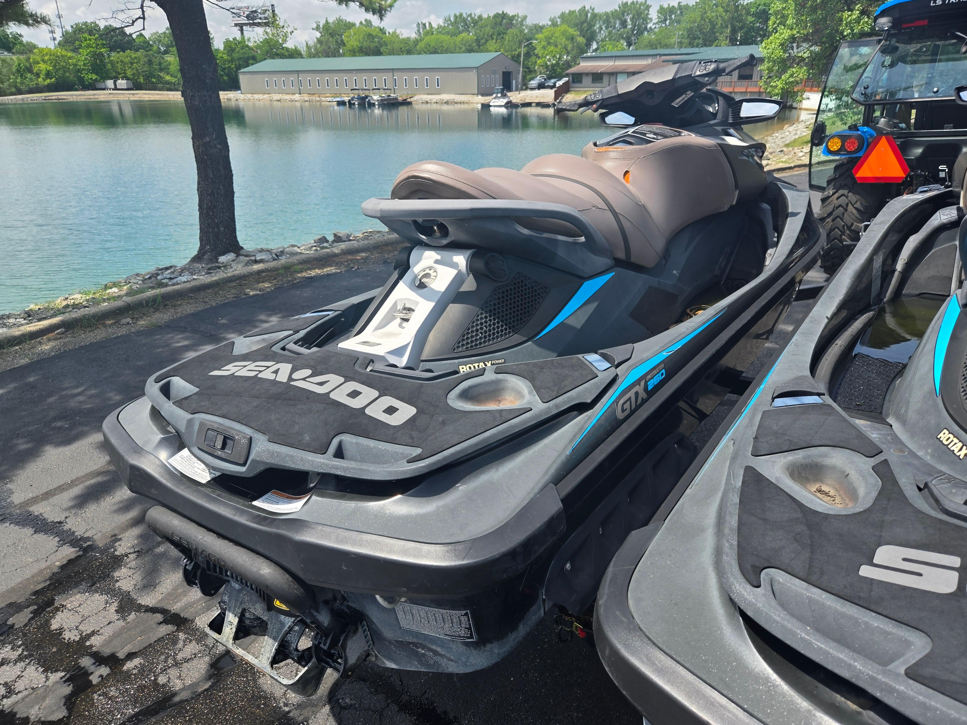 2016 Sea-Doo GTX Limited iS 260 jet ski parked by a serene lake.
