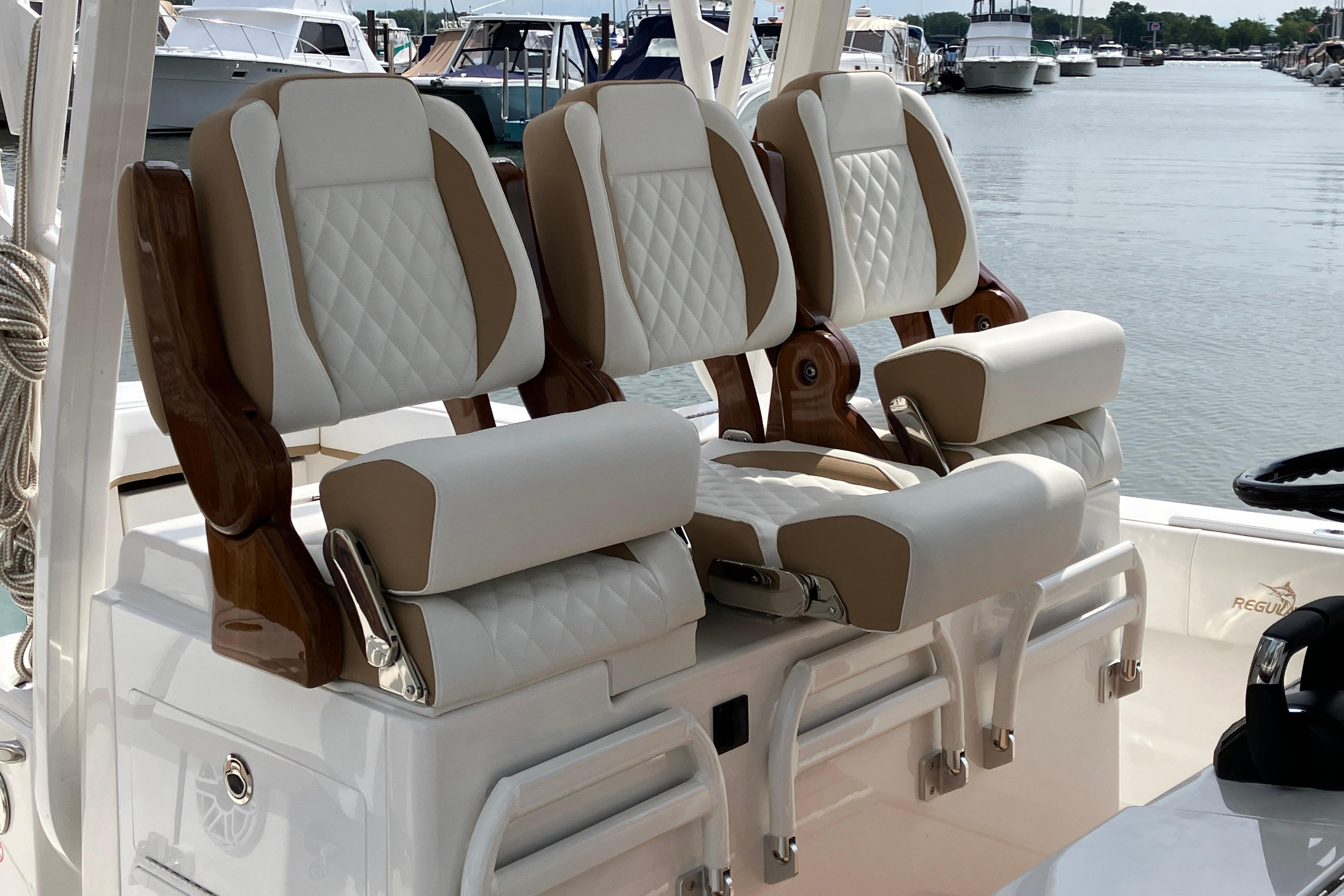 Luxury seating on a 2027 Regulator 35 boat, featuring elegant design and premium materials.