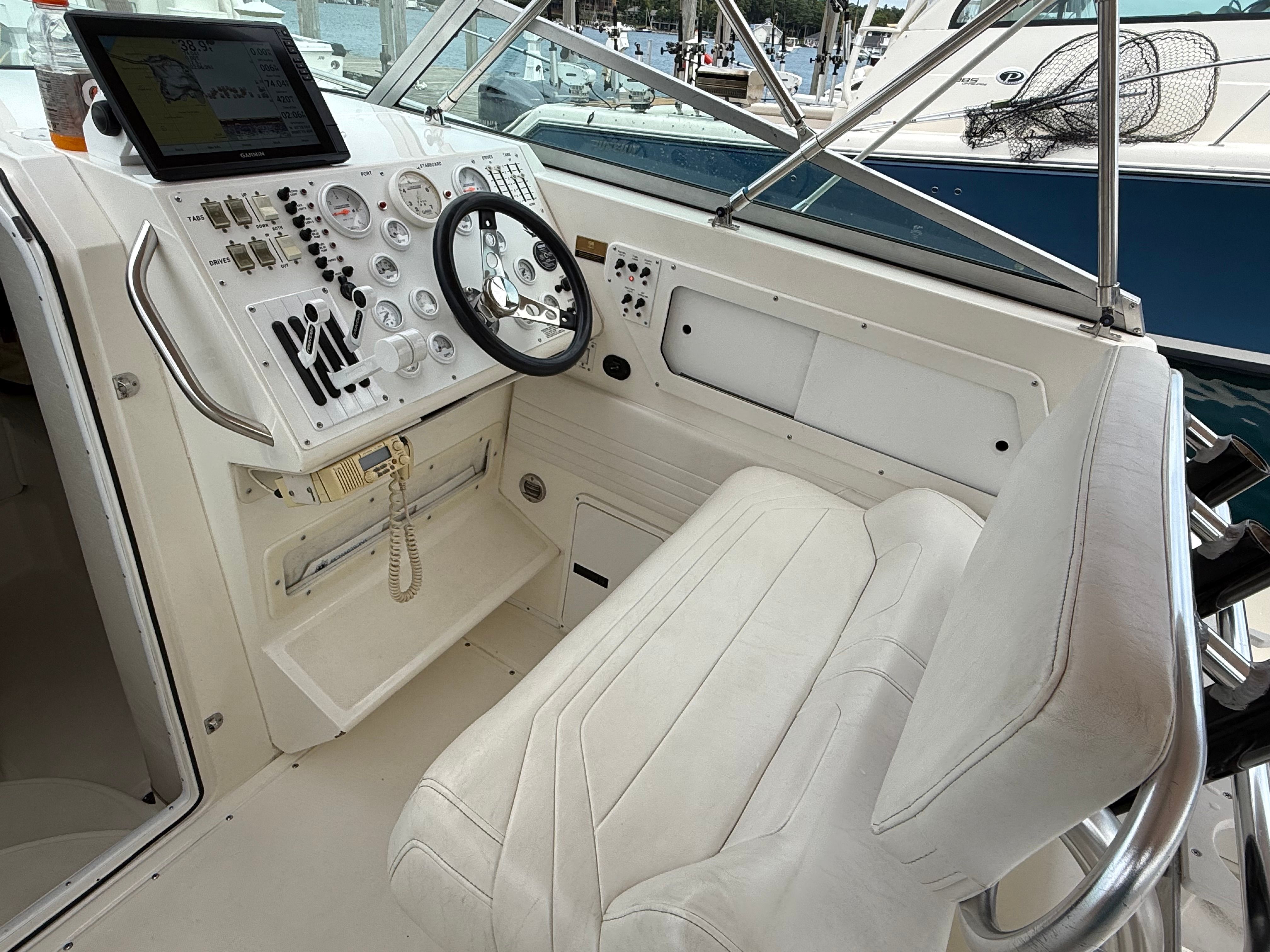 Interior view of a 1999 Fountain 32 Sport Fish Cruiser cockpit.