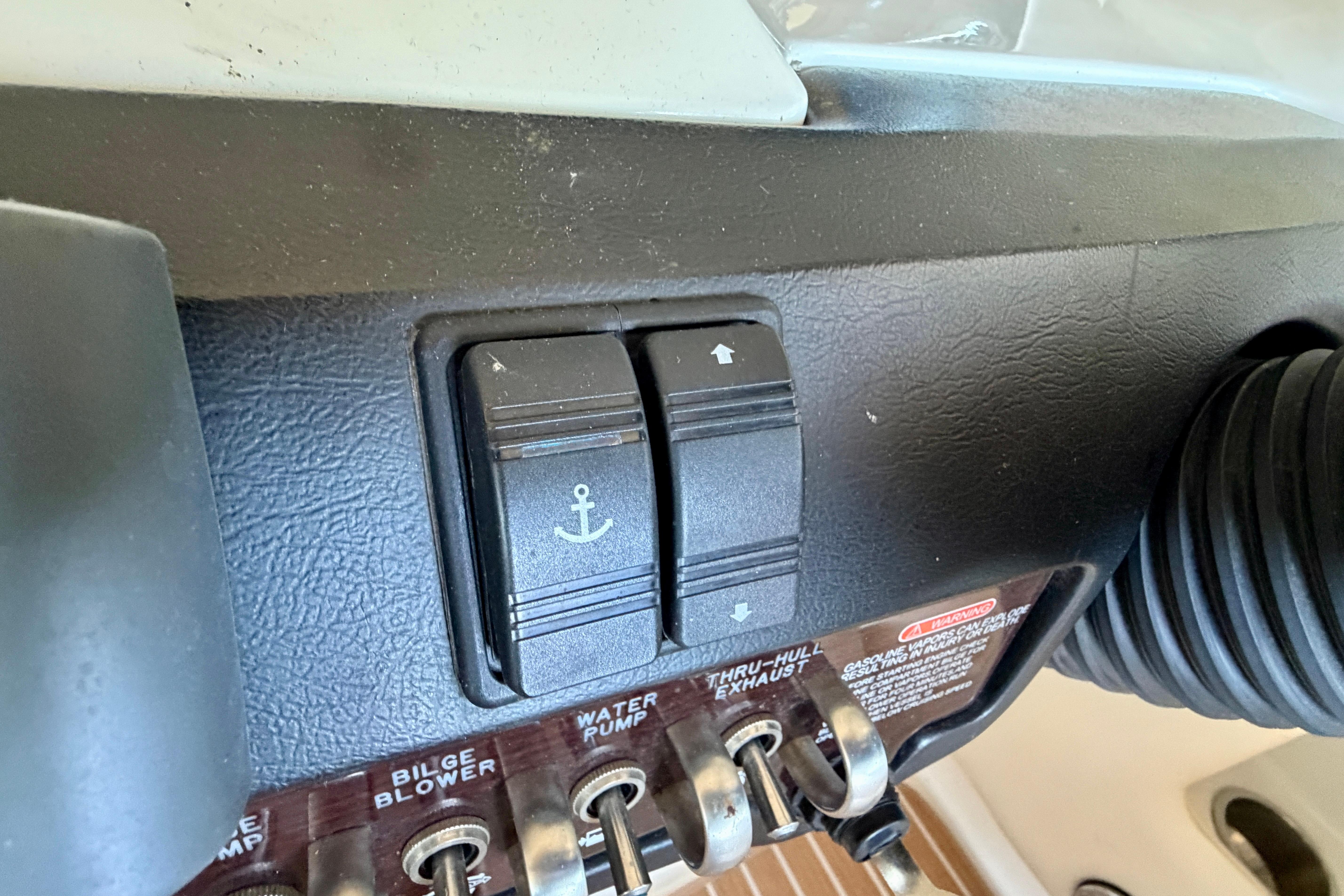 Control panel of a 2007 Sea Ray 270 SLX boat with anchor switch.