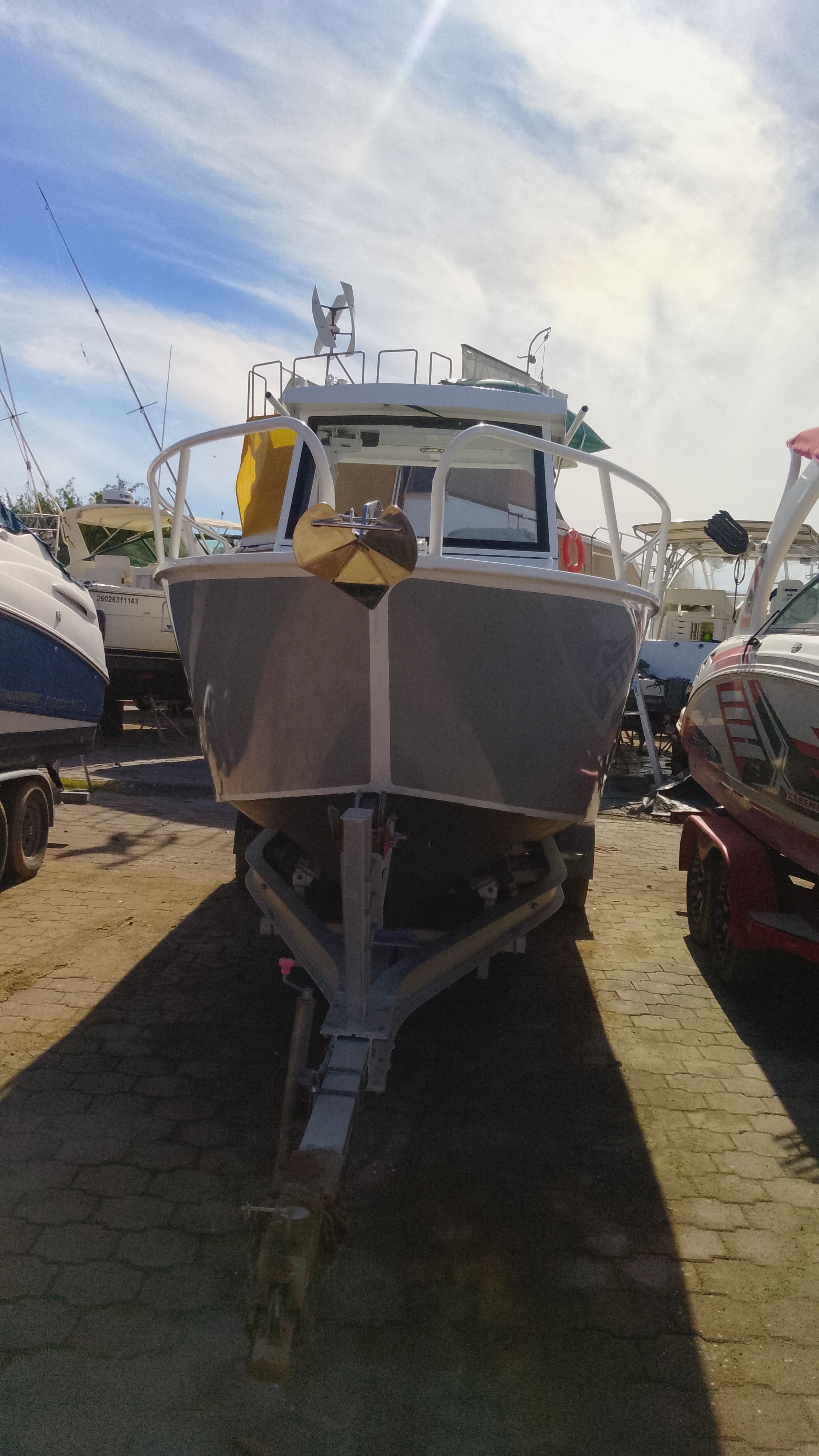 Gospel Boat 7.5M 2024 on trailer outdoors.