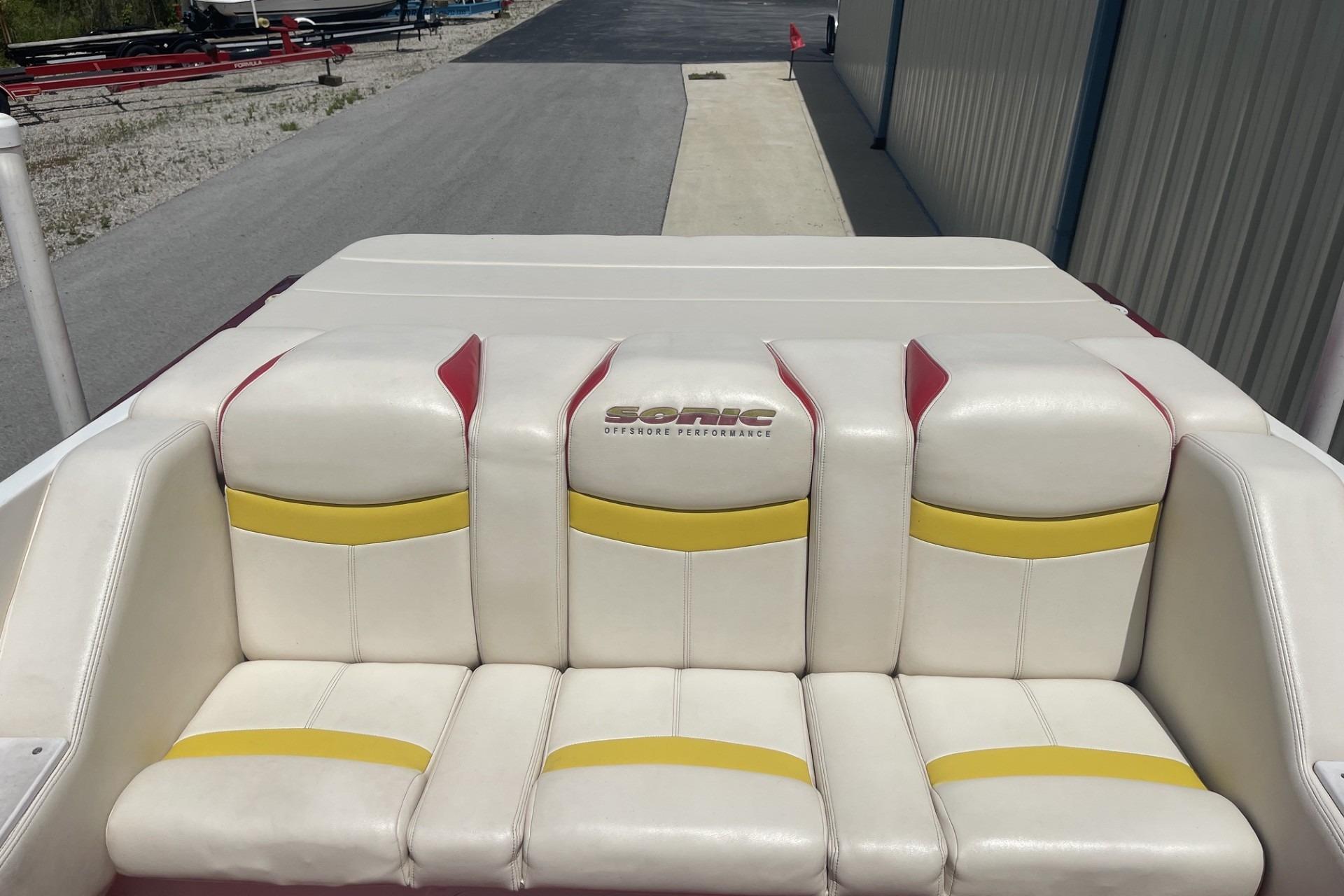 White and yellow boat seats on a 2006 Sonic 386 model.