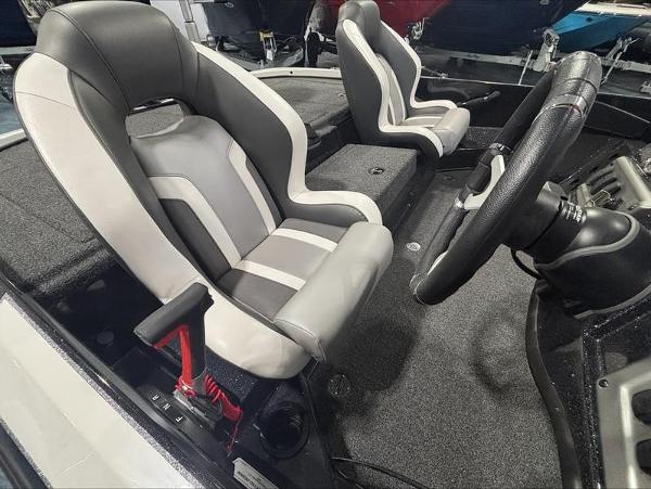 2025 Nitro Z18 boat interior with sleek, modern seats and steering wheel.