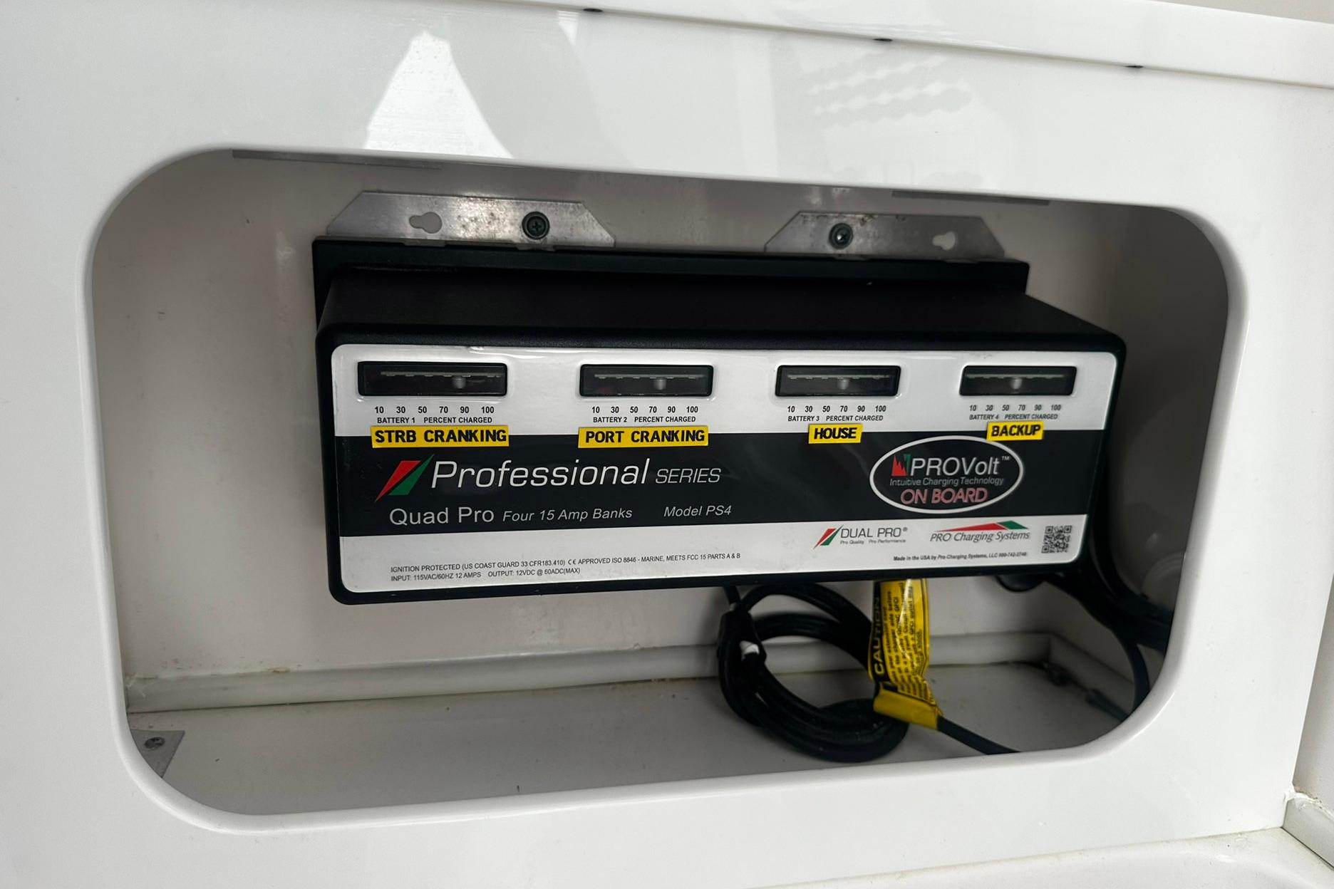 Onboard battery charger in a 2002 Sea Fox 228 Commander boat compartment.