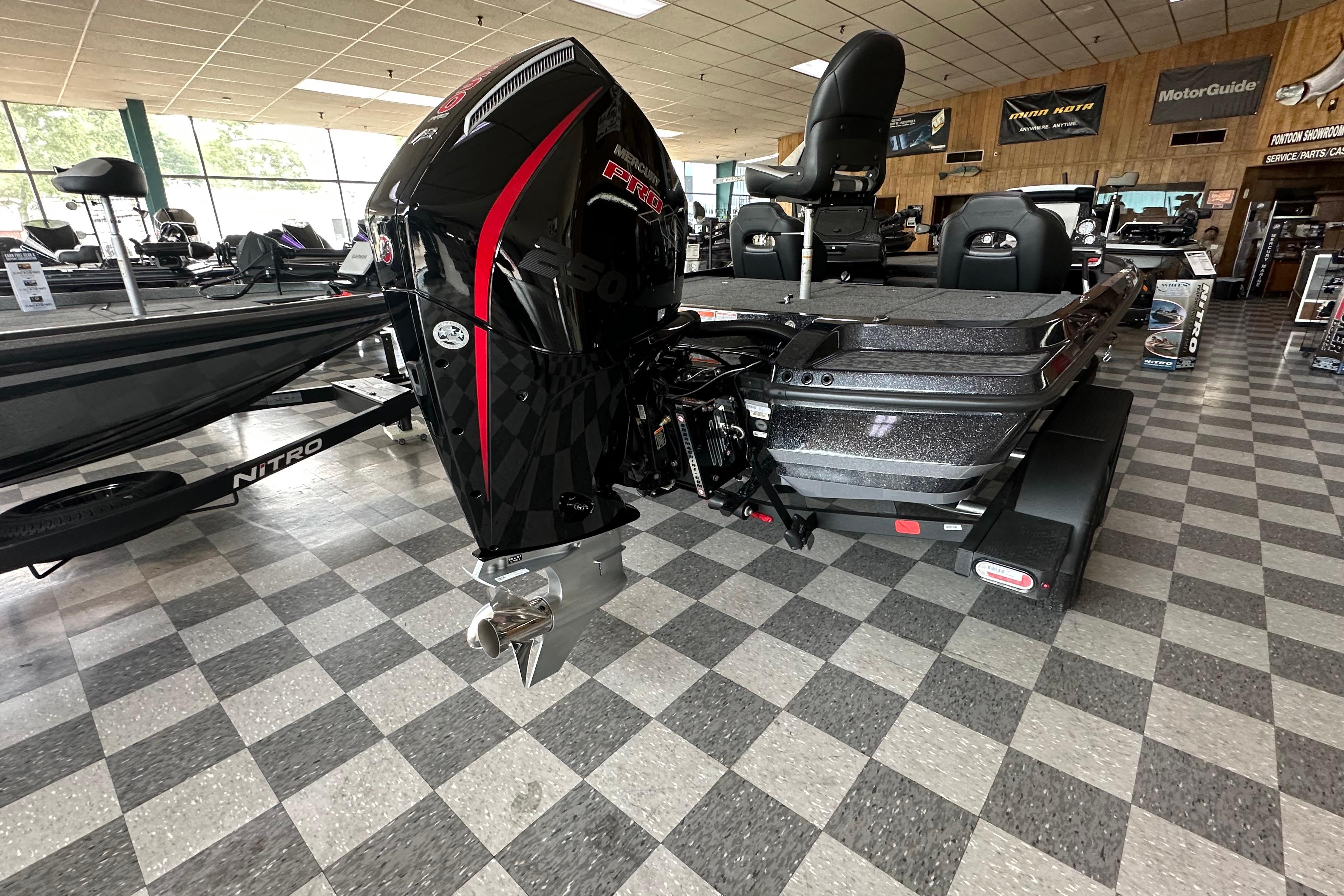 2025 Nitro Z20 XL Pro boat with Mercury engine in showroom.
