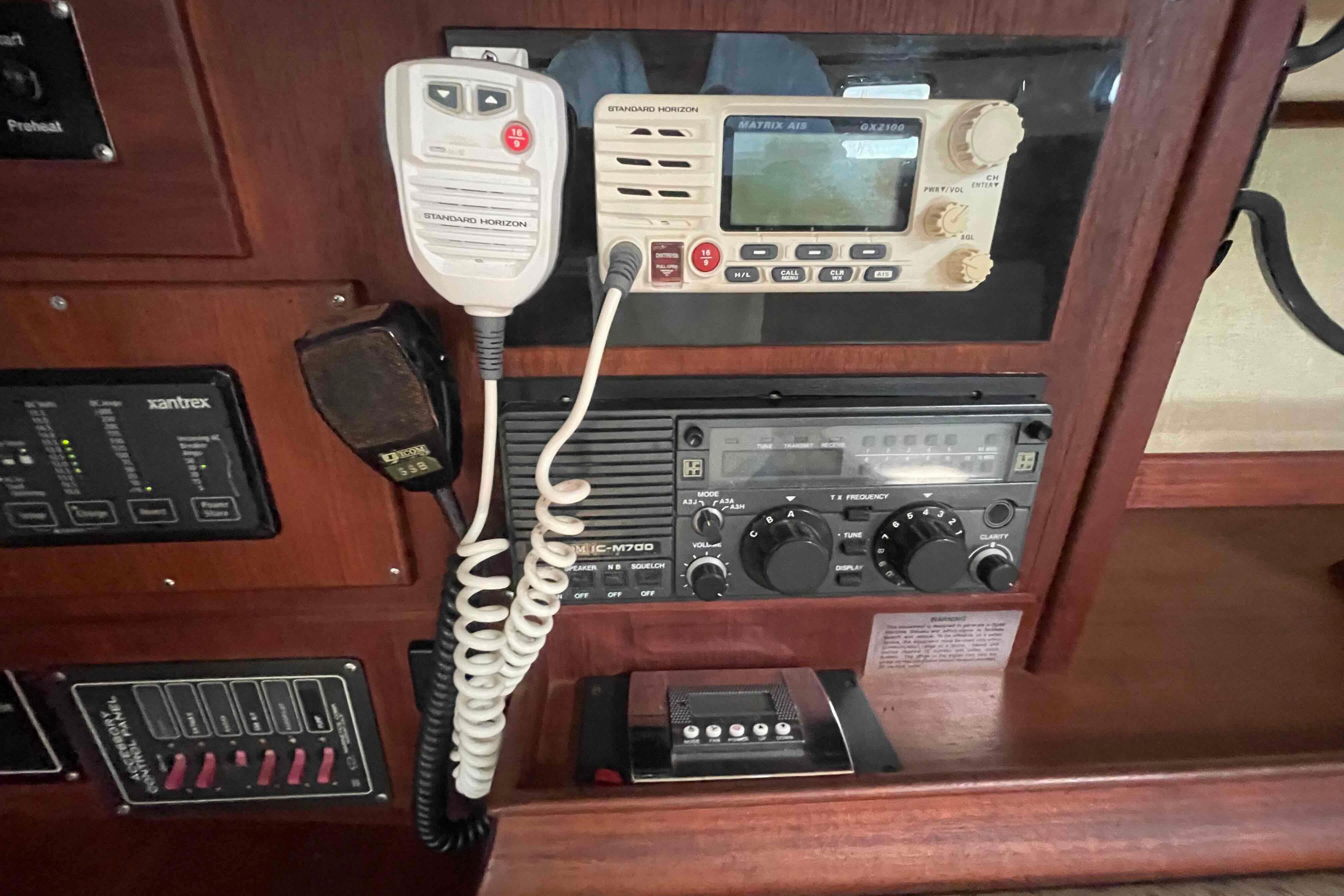 1989 Island Packet 35 yacht radio and control panel with communication equipment.