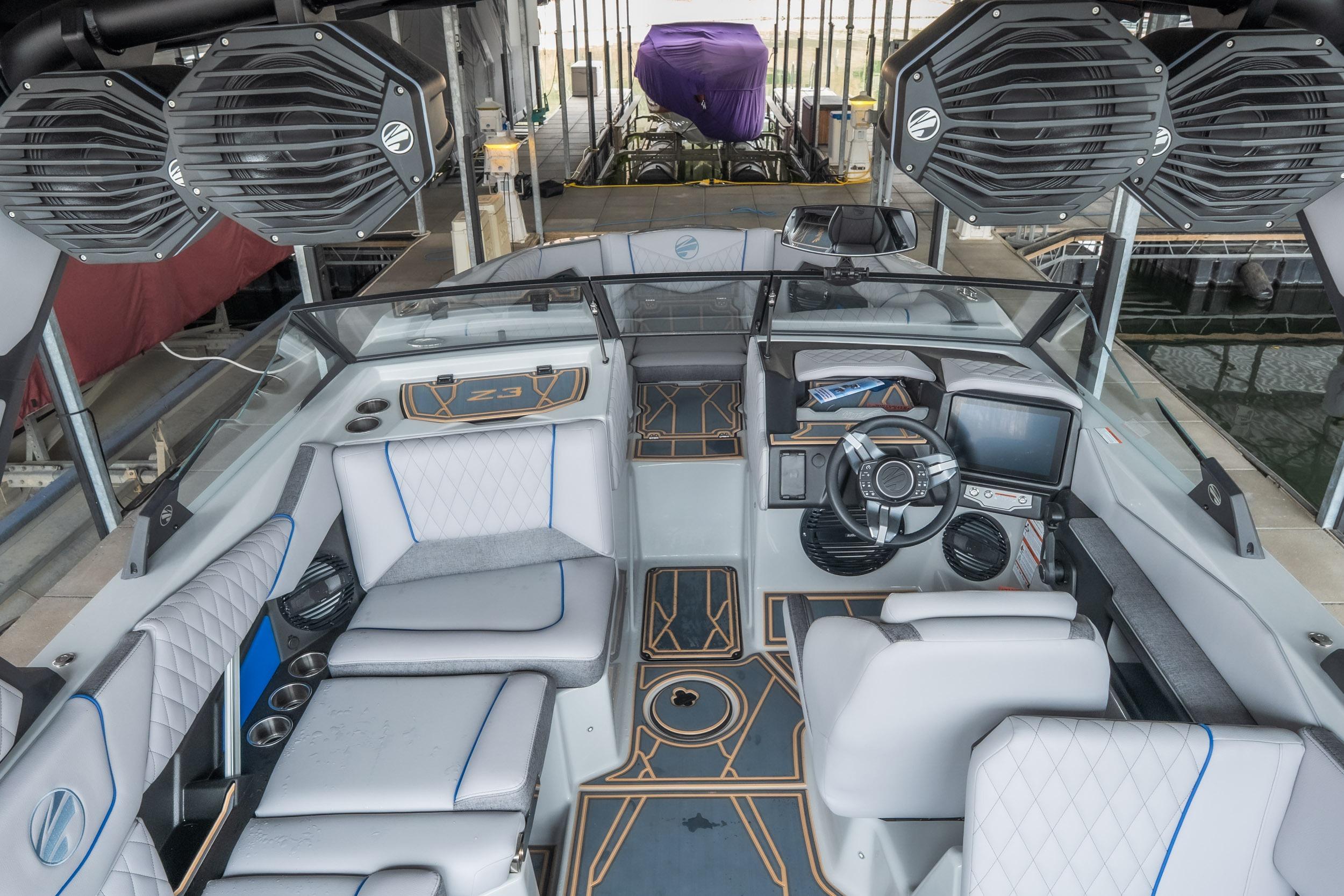 2026 Tigé Z3 boat interior with modern dashboard, luxury seating, and advanced audio system.