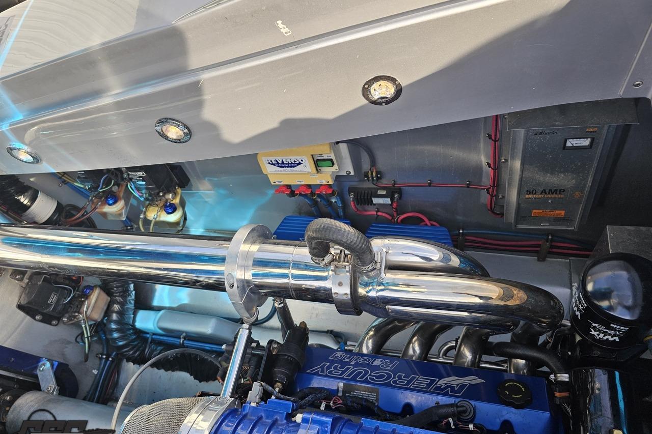 Engine compartment of a 2007 Hustler 41 Razor boat with Mercury Racing components.