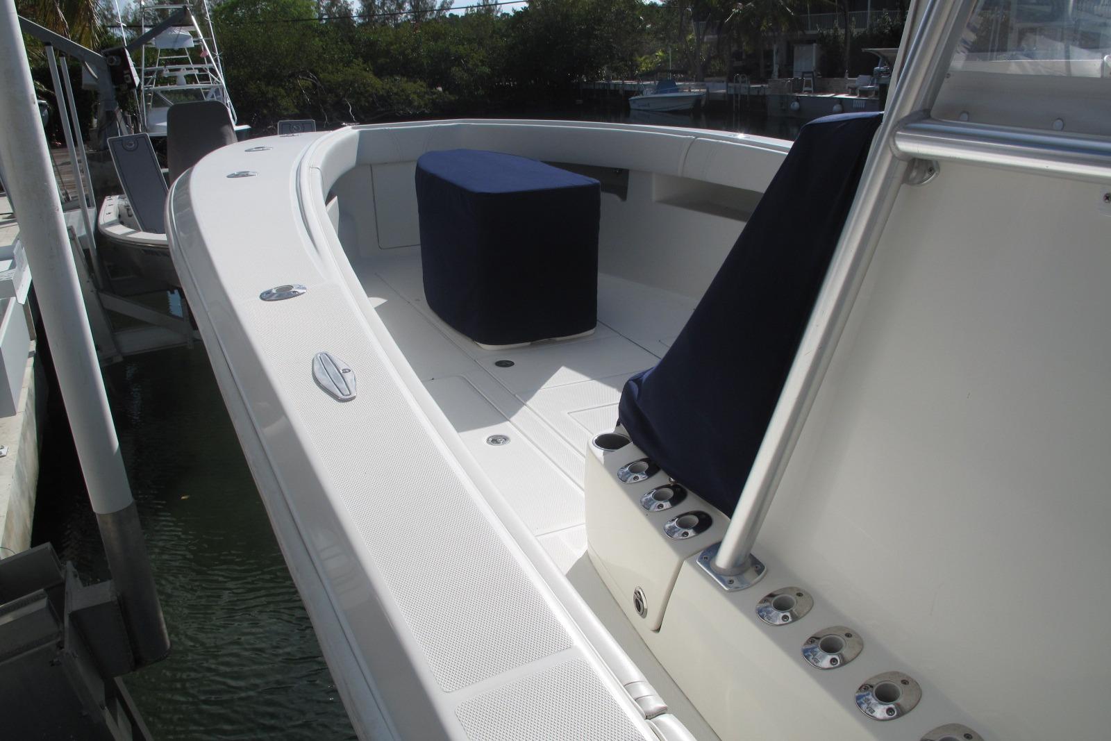 2017 SeaVee 340B boat deck with seating and rod holders.