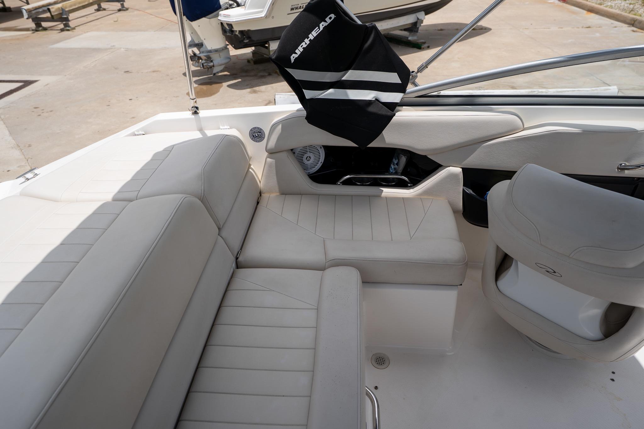 Interior of a 2008 Regal 2000 Bowrider boat with beige seating.