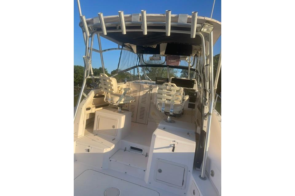 2002 Grady-White Marlin 300 boat interior with helm and seating area.