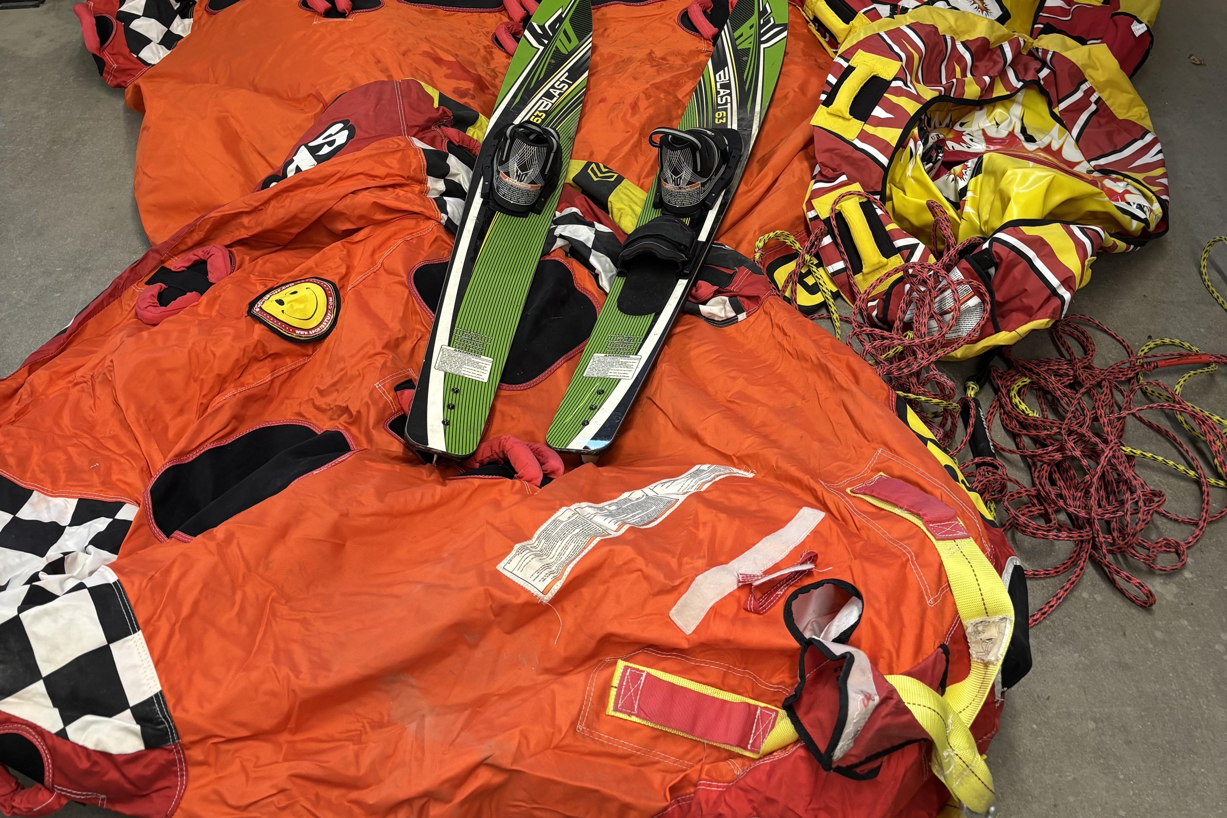 Colorful water sports gear with skis and ropes, suitable for Larson SEi 200 Cuddy I/O 1993.