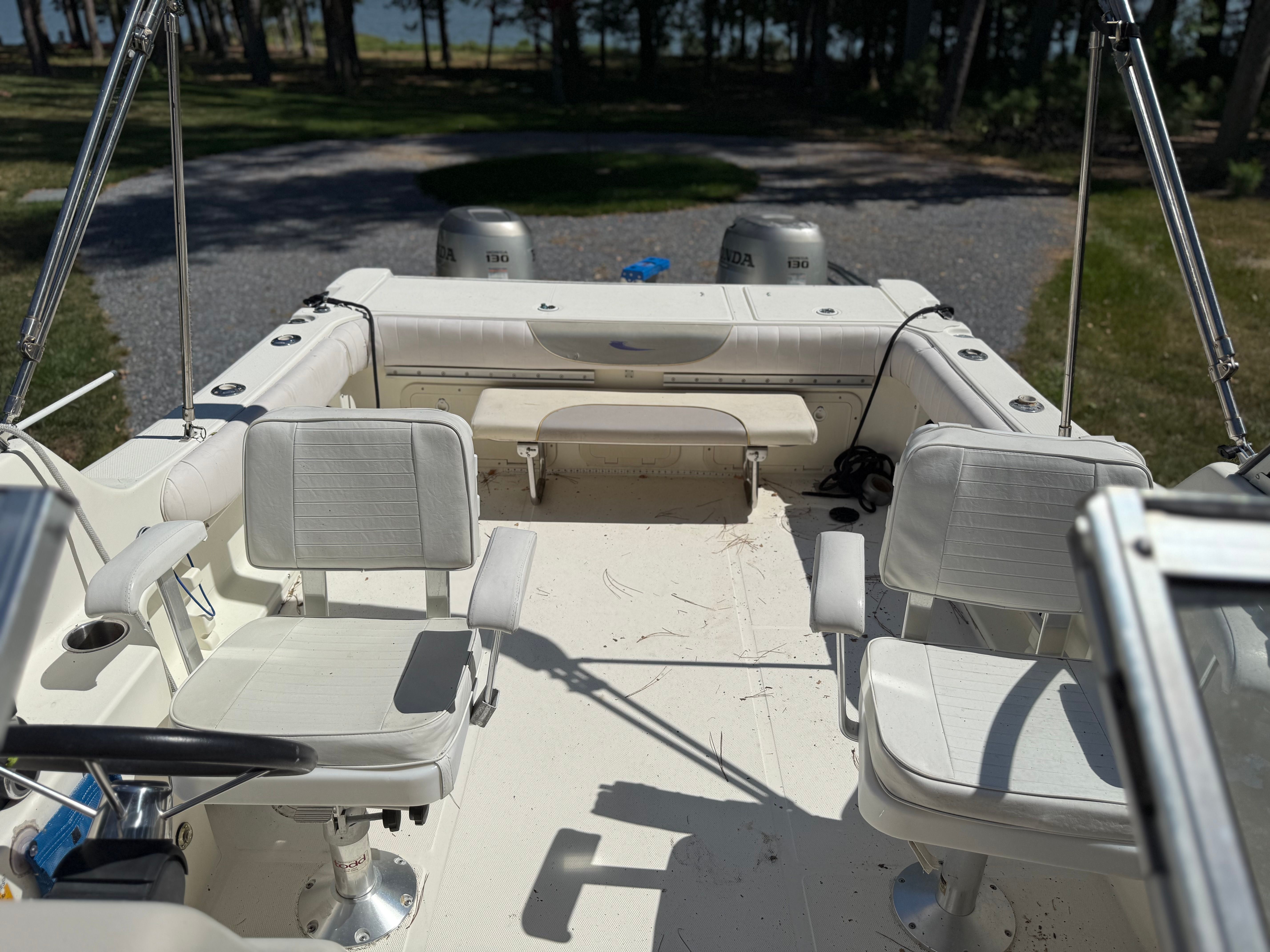 Interior of a 2002 World Cat 246 DC boat with seating.