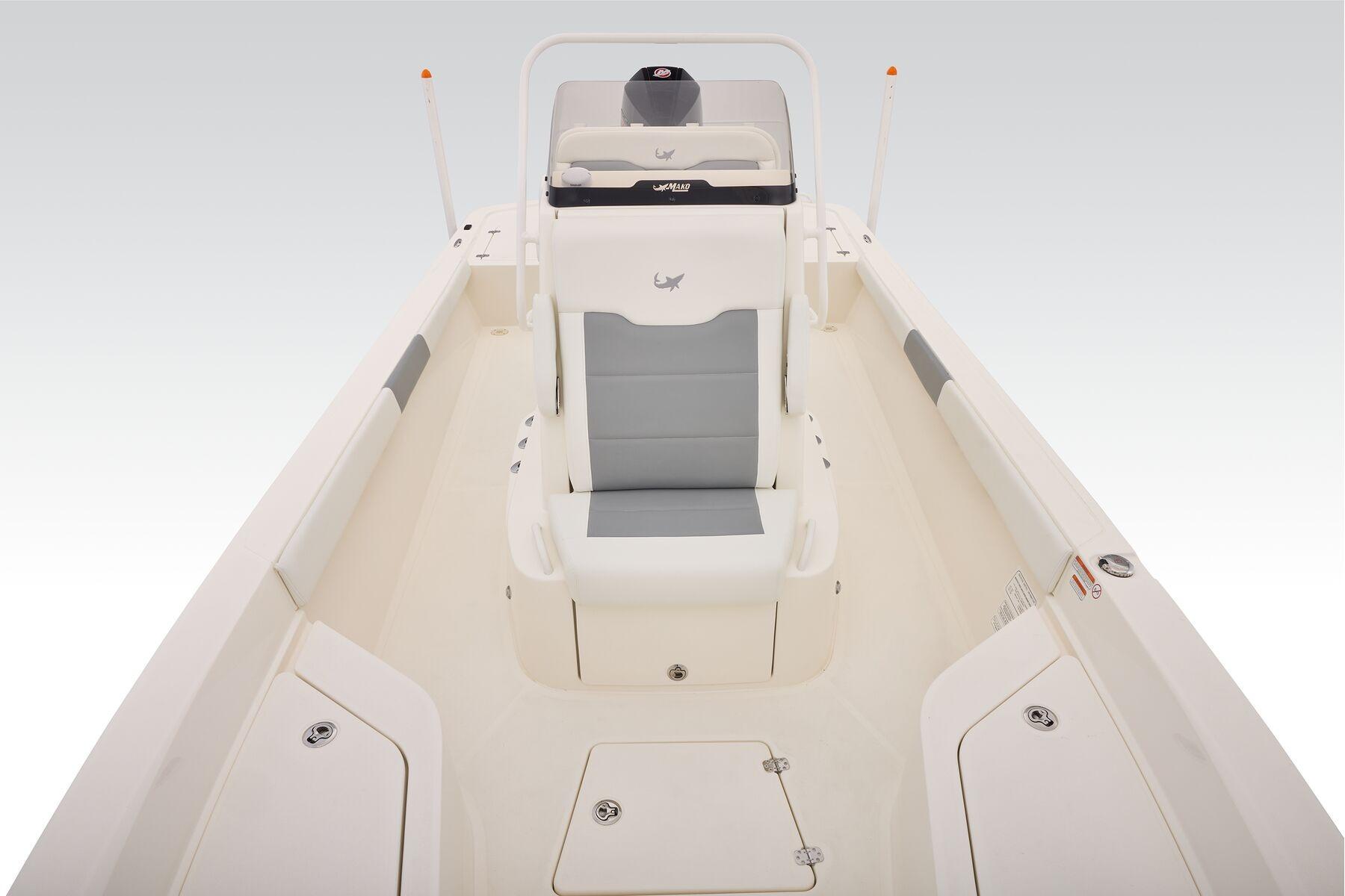 2026 Mako 24 APEX boat interior with sleek seating and storage compartments.
