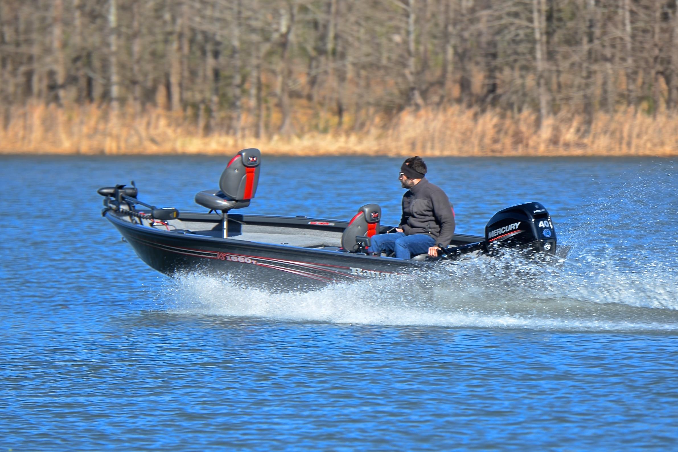 2021 Ranger VS1660 T boat speeding on a lake with a Mercury engine.