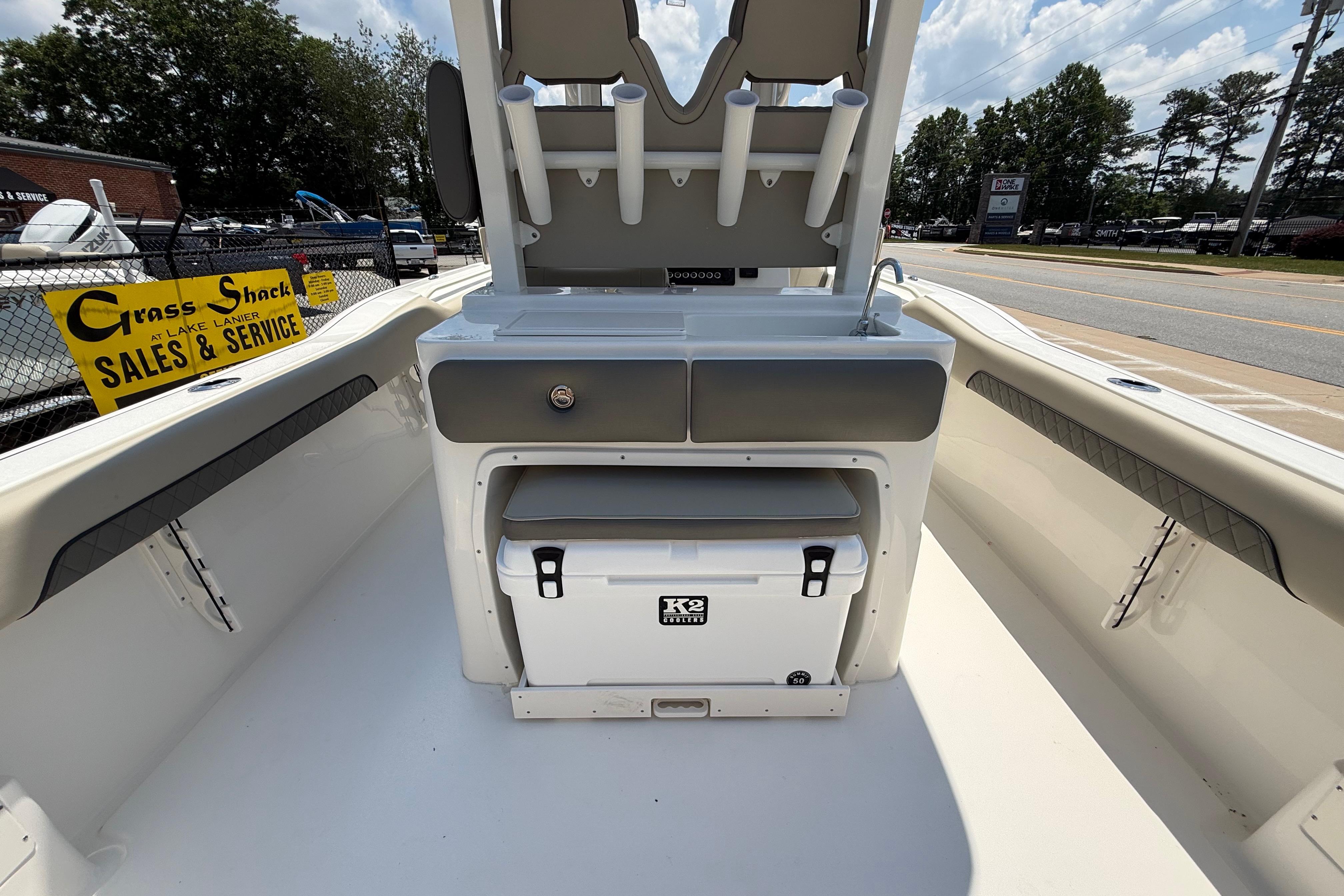 2027 Key West 249 FS boat interior with seating and storage, displayed at Grass Shack sales.