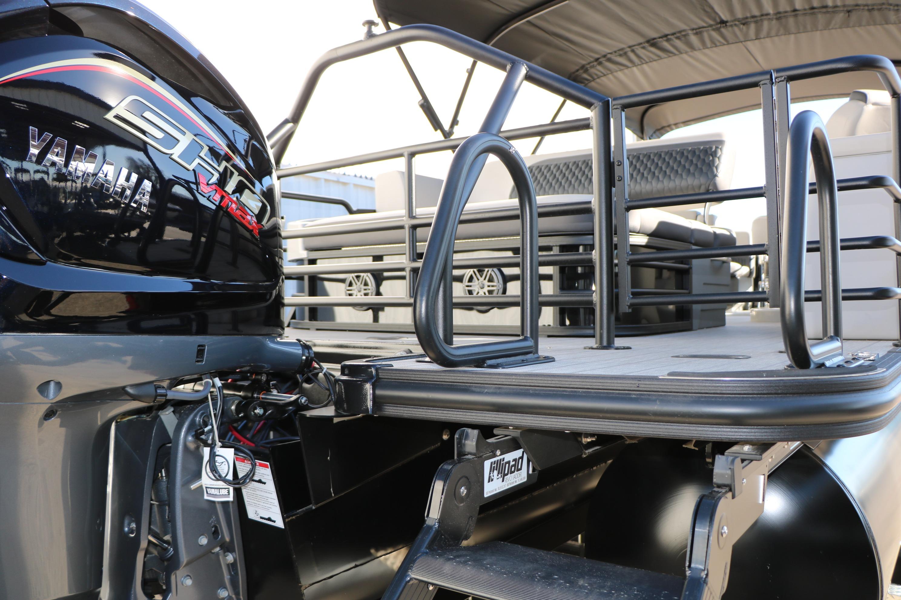 2026 Sylvan L3 CLZ DH pontoon boat with Yamaha engine, rear view.
