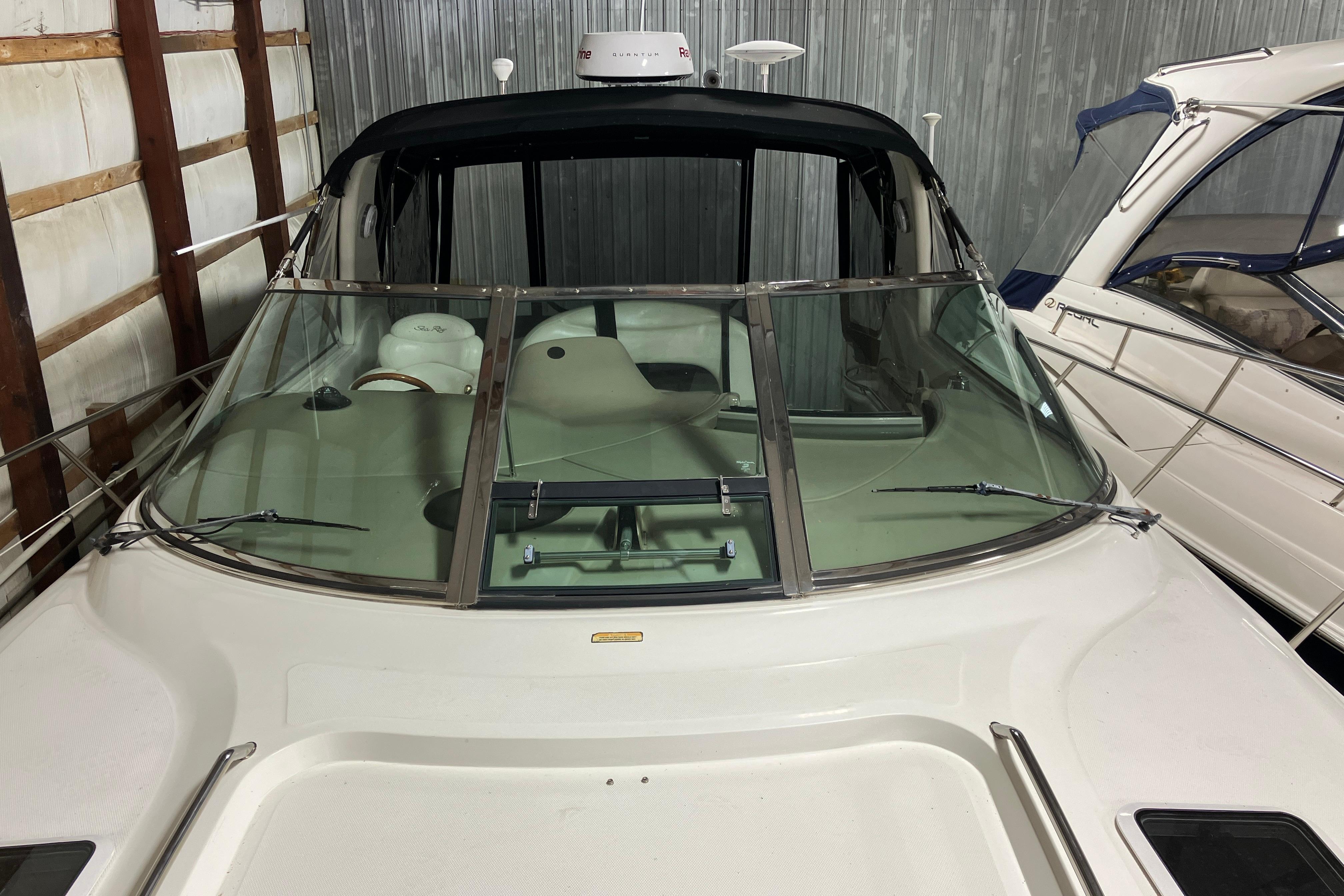 2002 Sea Ray 410 Sundancer in a storage facility.