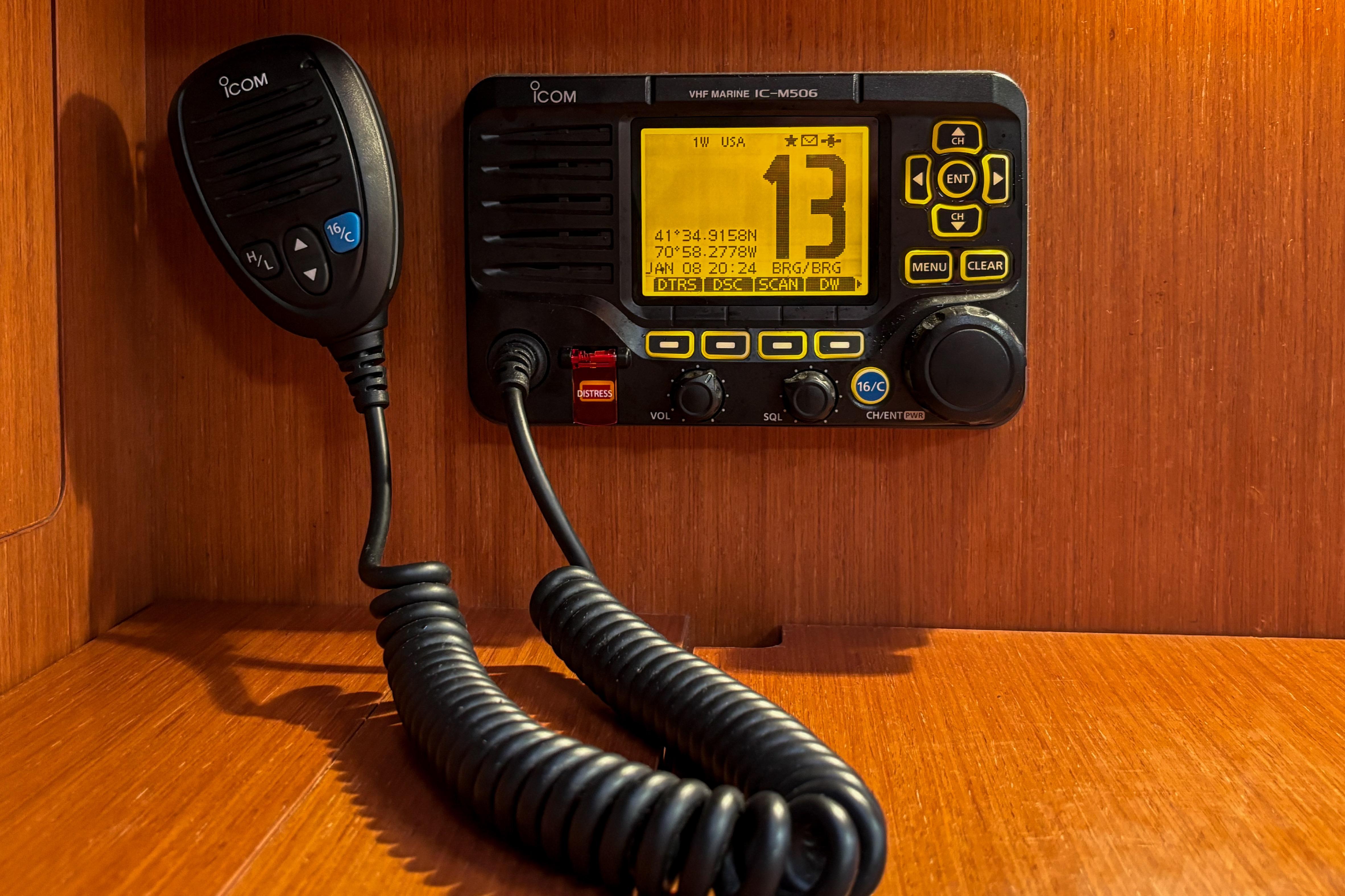 VHF marine radio on 2015 Beneteau Oceanis 37 yacht, featuring Icom IC-M506 model.