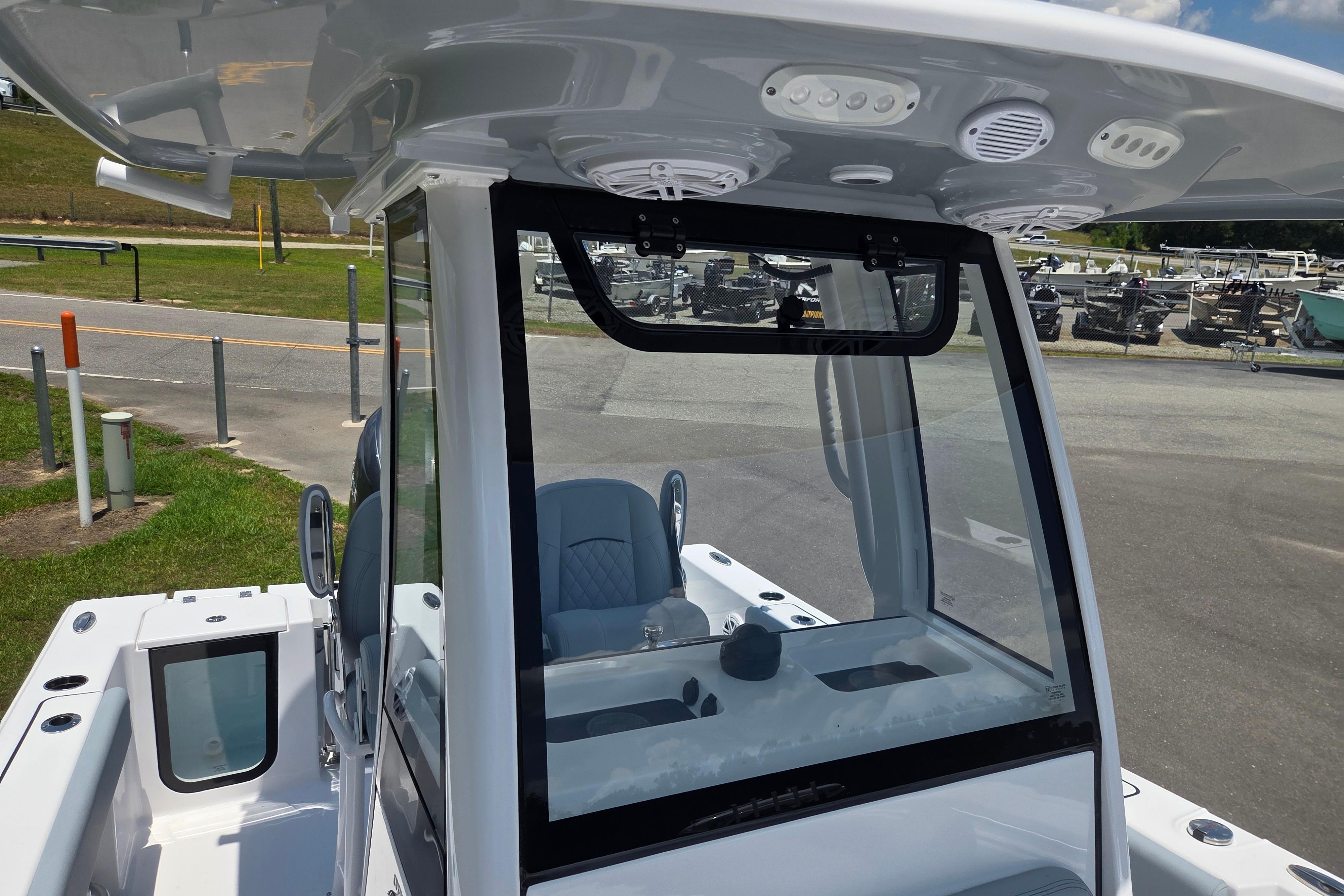 2026 Sportsman Open 212 Center Console boat with modern helm and seating.