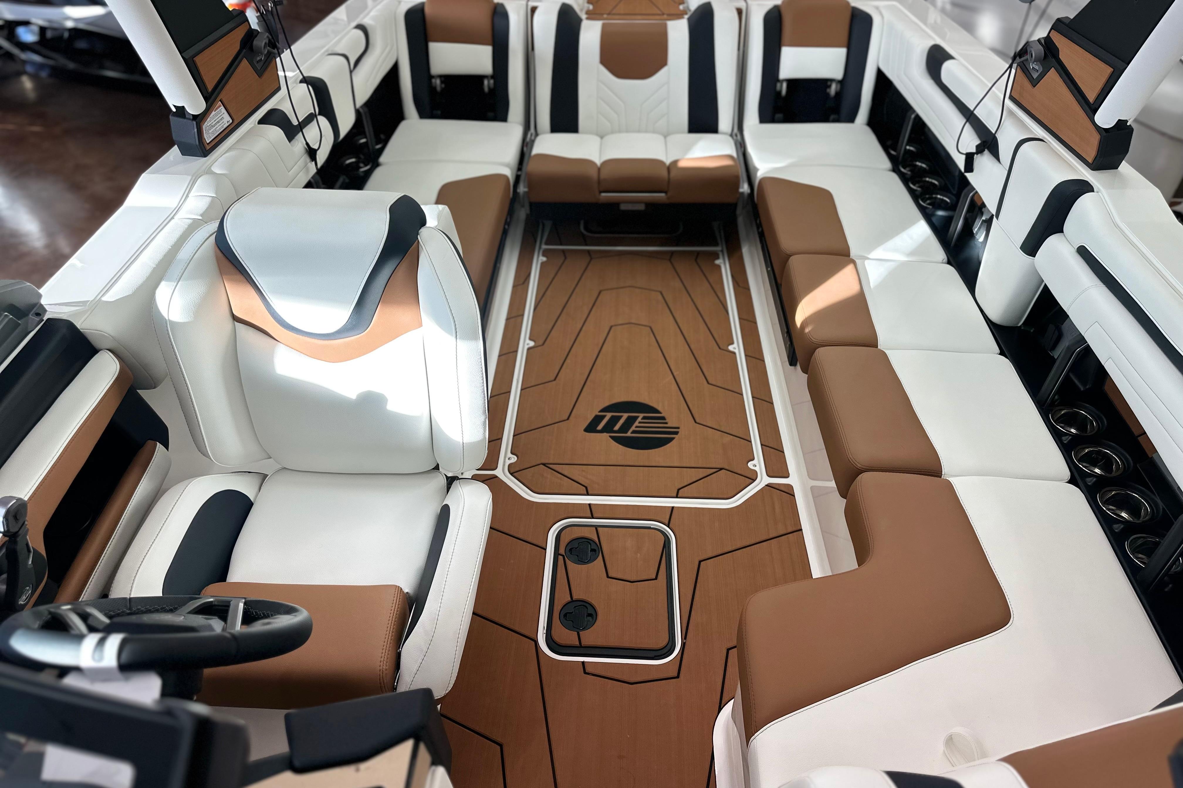 Luxurious interior of 2026 Malibu Wakesetter 25 LSV boat with stylish seating.