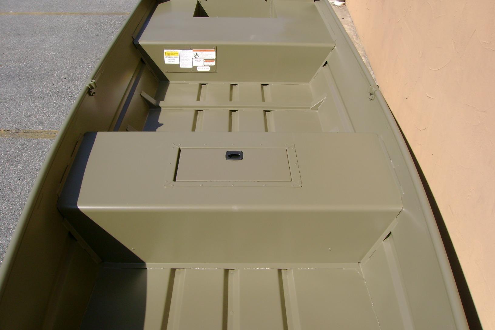 2026 Tracker Grizzly 15 Jon boat interior with storage compartments, shown in a neutral color.