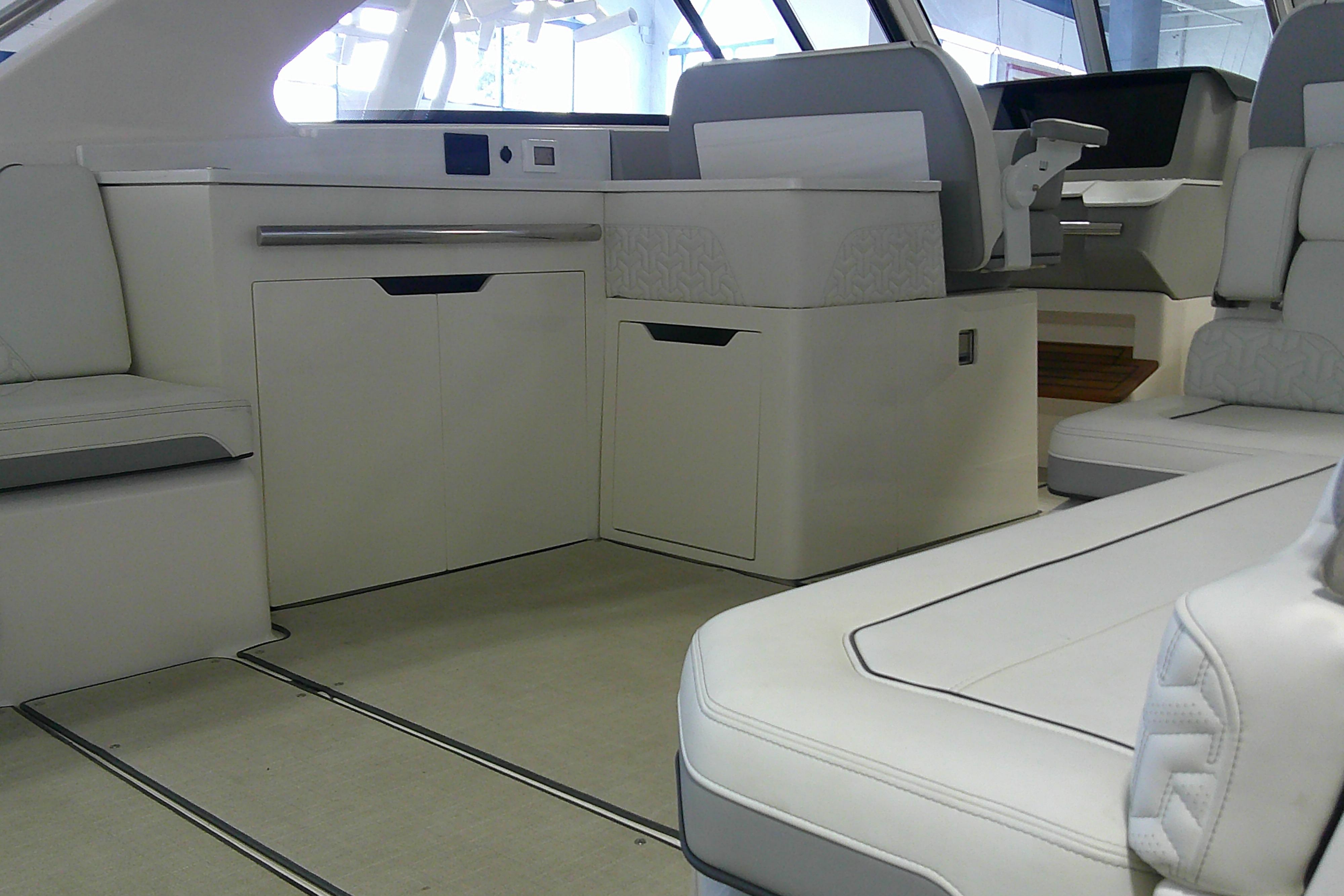Luxurious interior of 2023 Regal LX36 yacht with elegant seating and modern design.