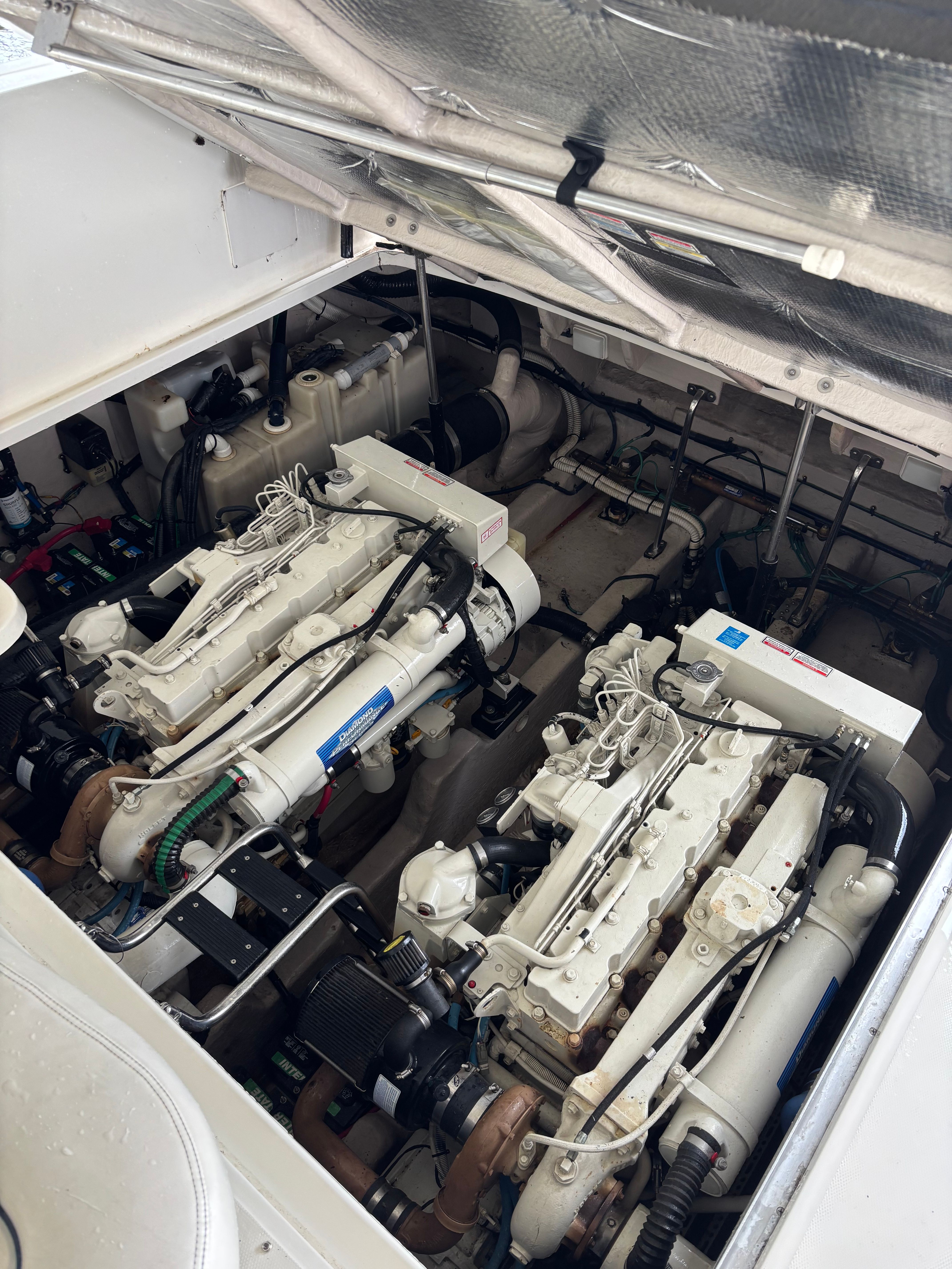 Engine room of 2004 Sea Ray 420 Sundancer with twin engines.