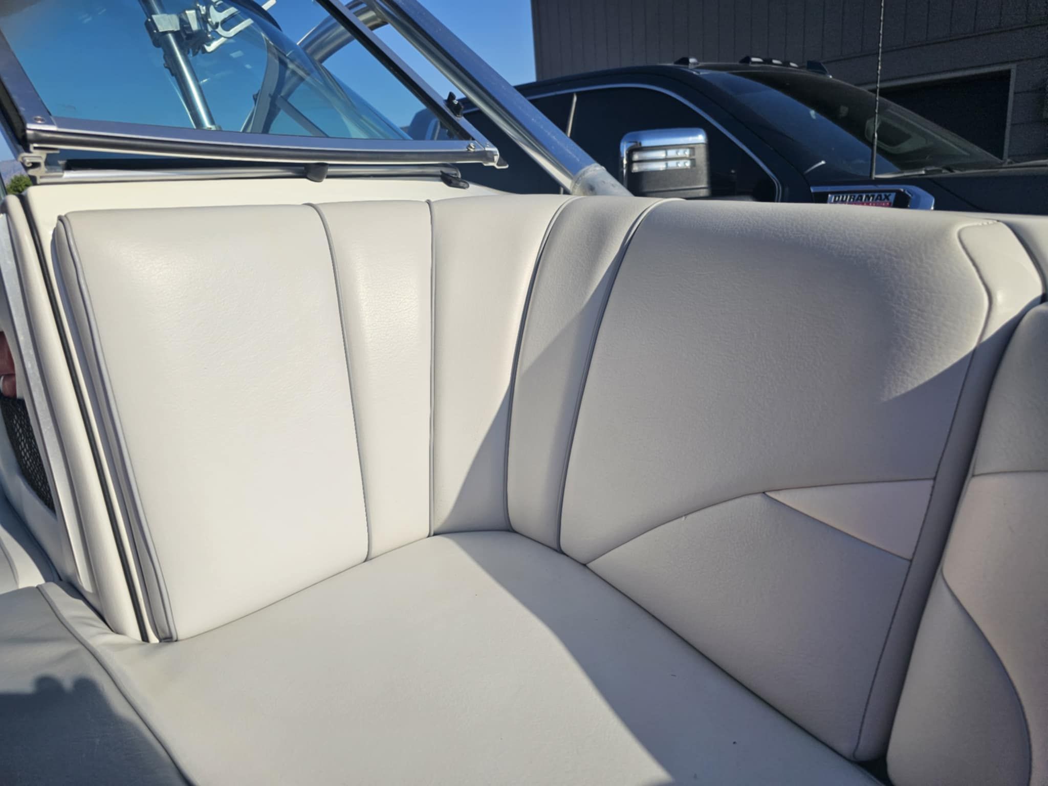 Interior of a 2006 MB PIGPR with light gray leather seats.