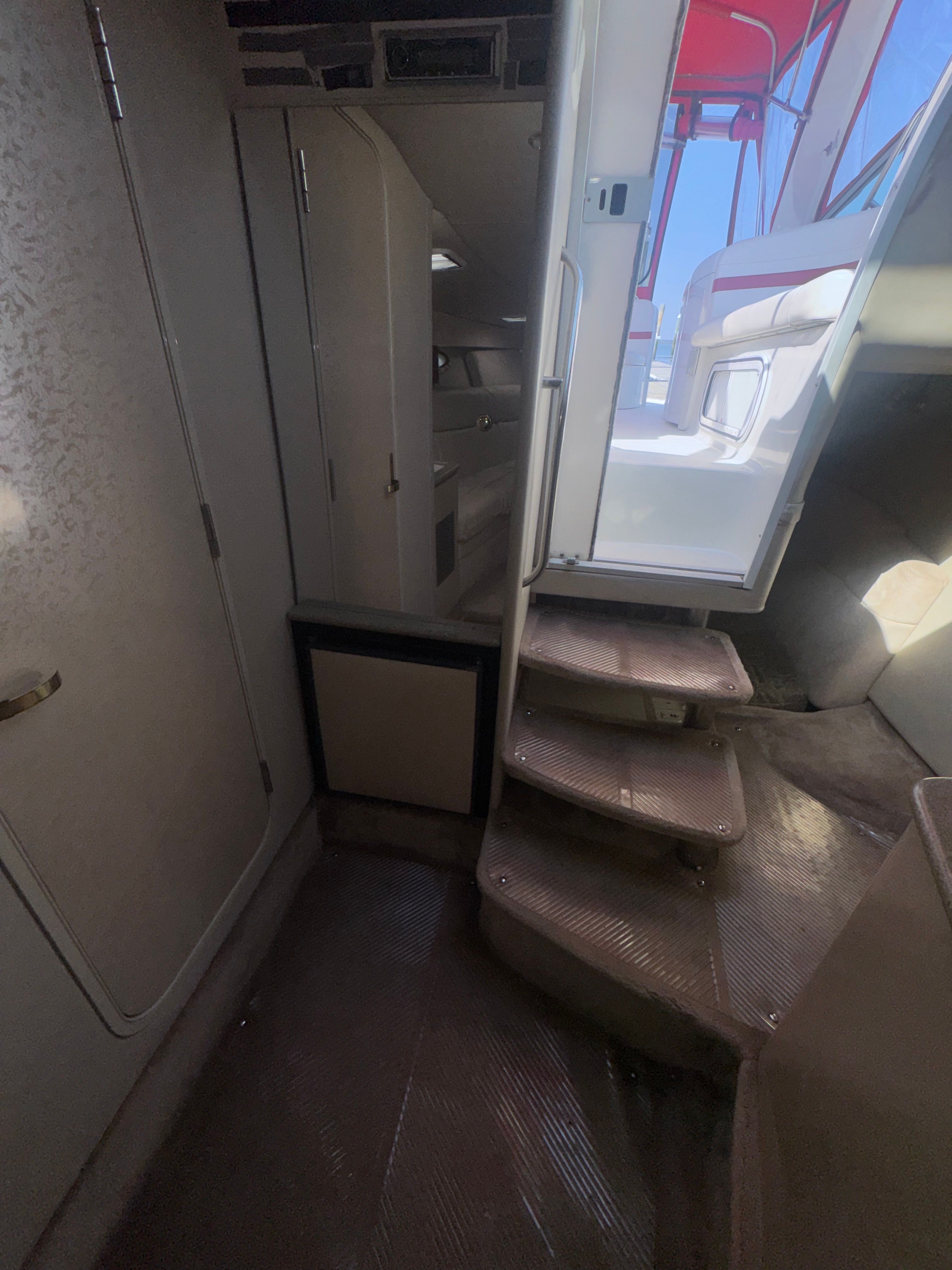 Interior of 2001 Formula 37 SUPER SPORT yacht with stairs and storage.