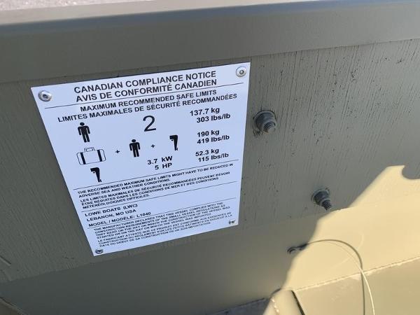 Compliance notice on 2024 Lowe L1040 Jon boat detailing weight and capacity limits.