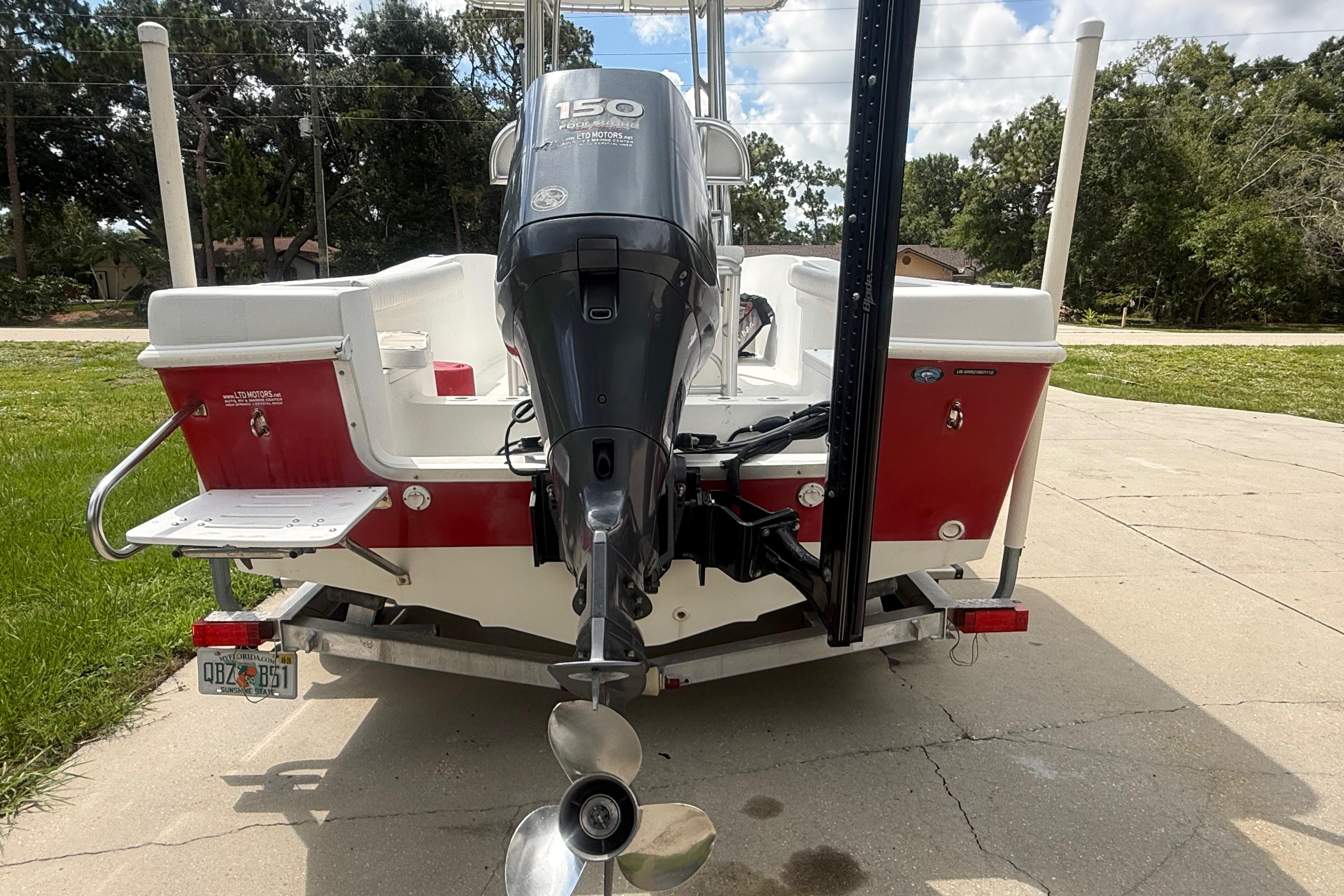 2012 Clearwater 2000 Center Console boat with Yamaha 150 outboard motor on trailer.