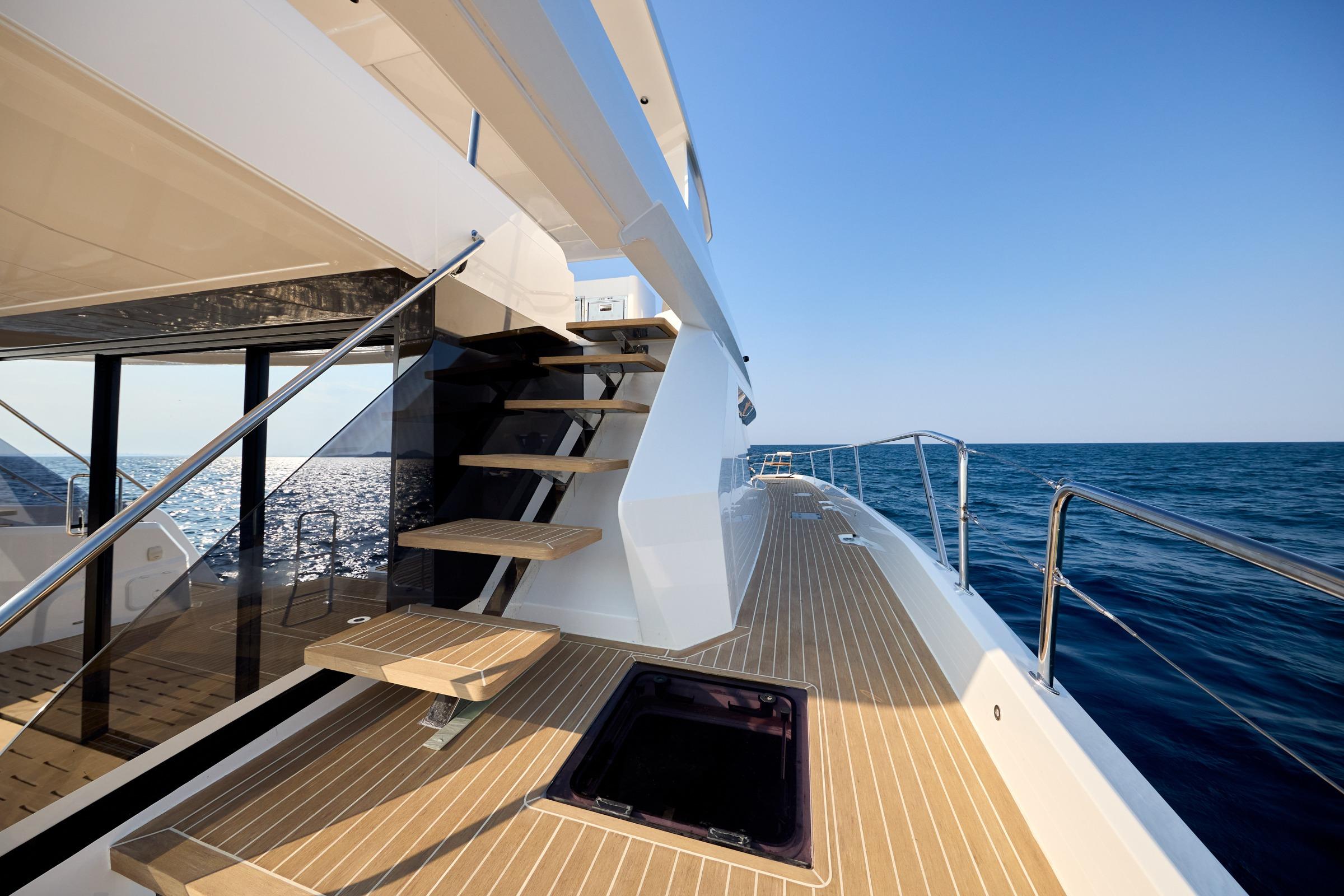 2025 Custom Omaya 50 Power Catamaran deck with ocean view and modern design.