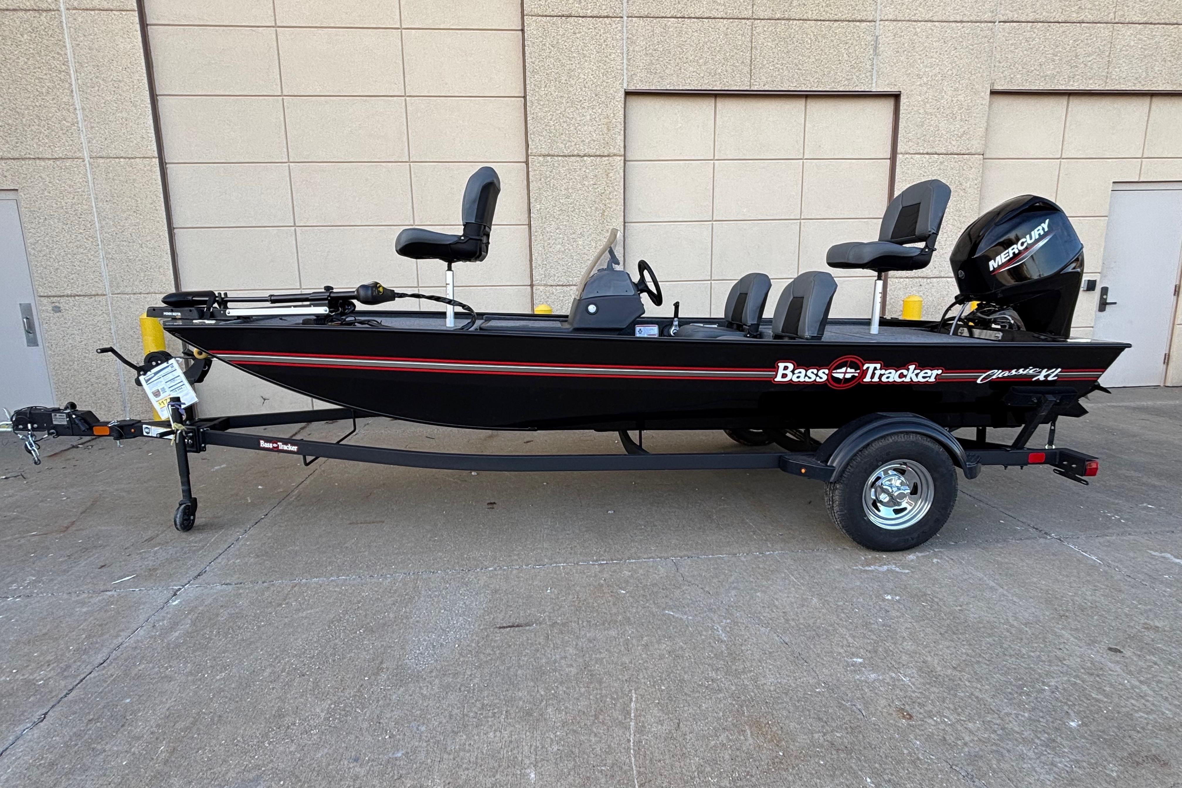 2026 Tracker Bass Tracker Classic XL fishing boat on trailer, parked outdoors.