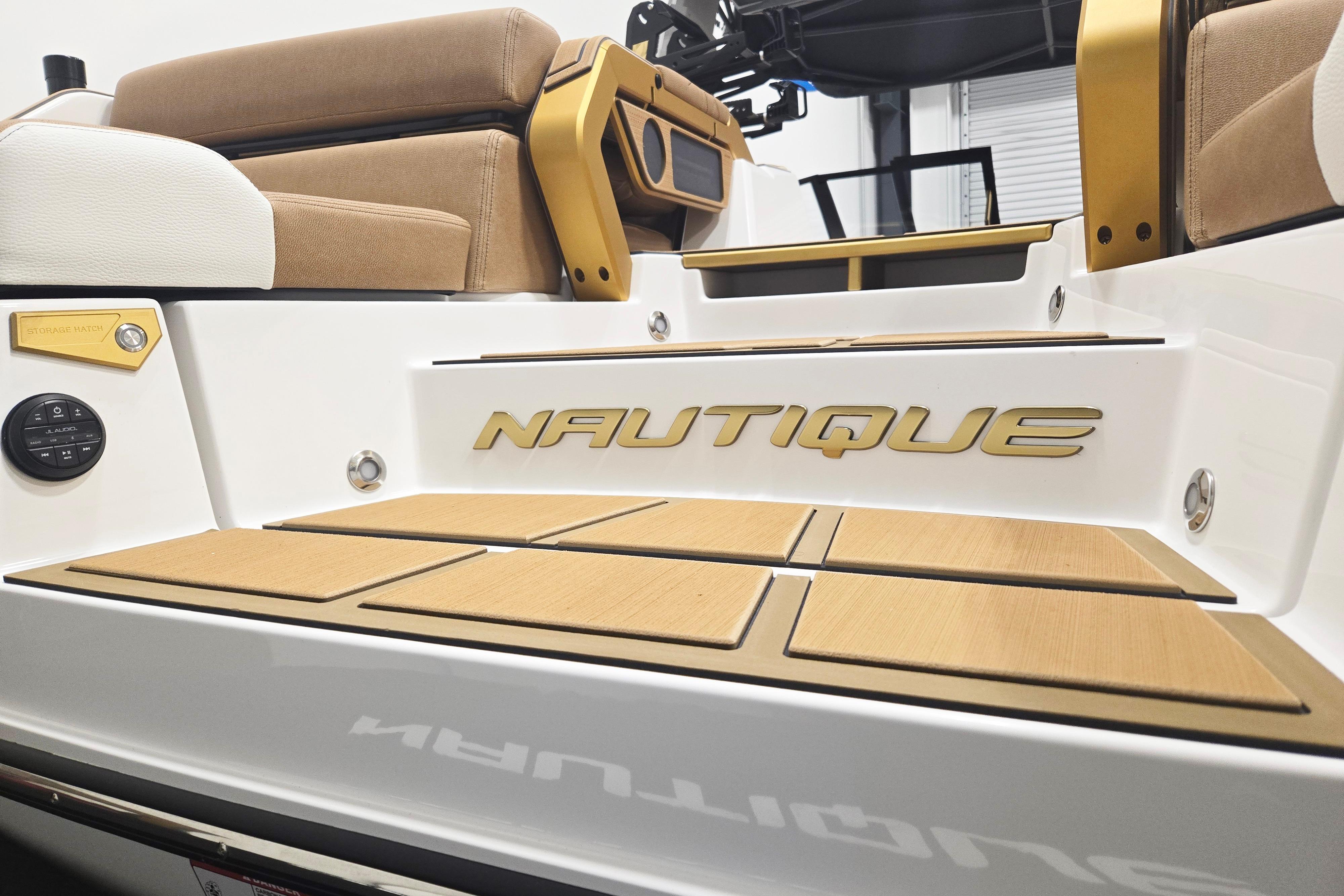 2026 Nautique Super Air Nautique G23 Paragon boat interior with luxury seating and branding.