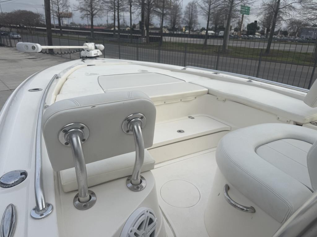 2017 ShearWater 270 Carolina Flare boat interior with white seating and stainless steel fixtures.
